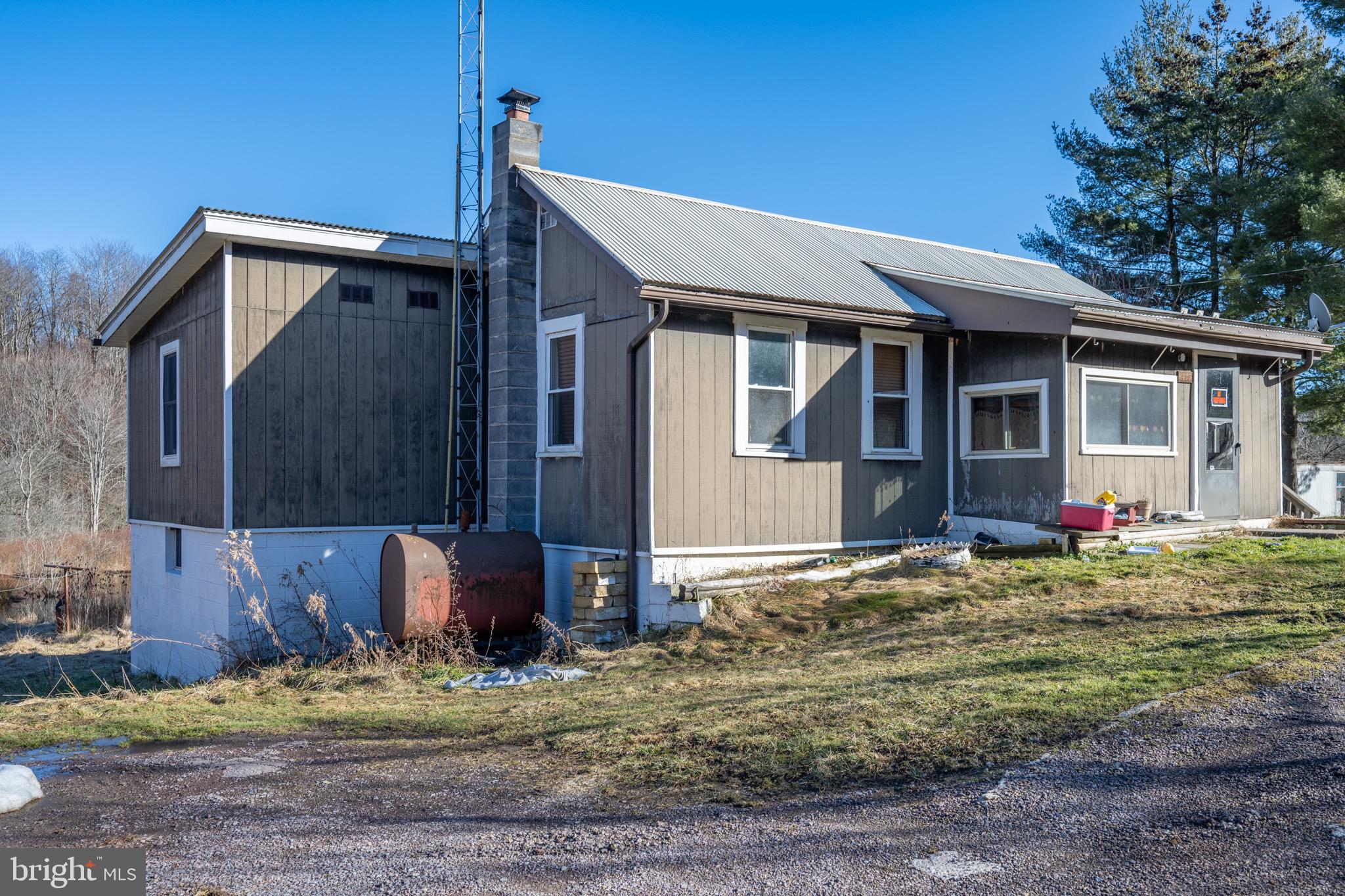FORECLOSURE – Incredible opportunity to scoop up an affordable home with easy access to I-68, 1 mile outside the town of Grantsville. Handyman special, for someone who is willing to roll up their sleeves for a good deal! 2 Bedroom, 1.5 bathrooms with covered porch and full unfinished basement. Nestled on .34 acres of ground, with rolling mountain views.