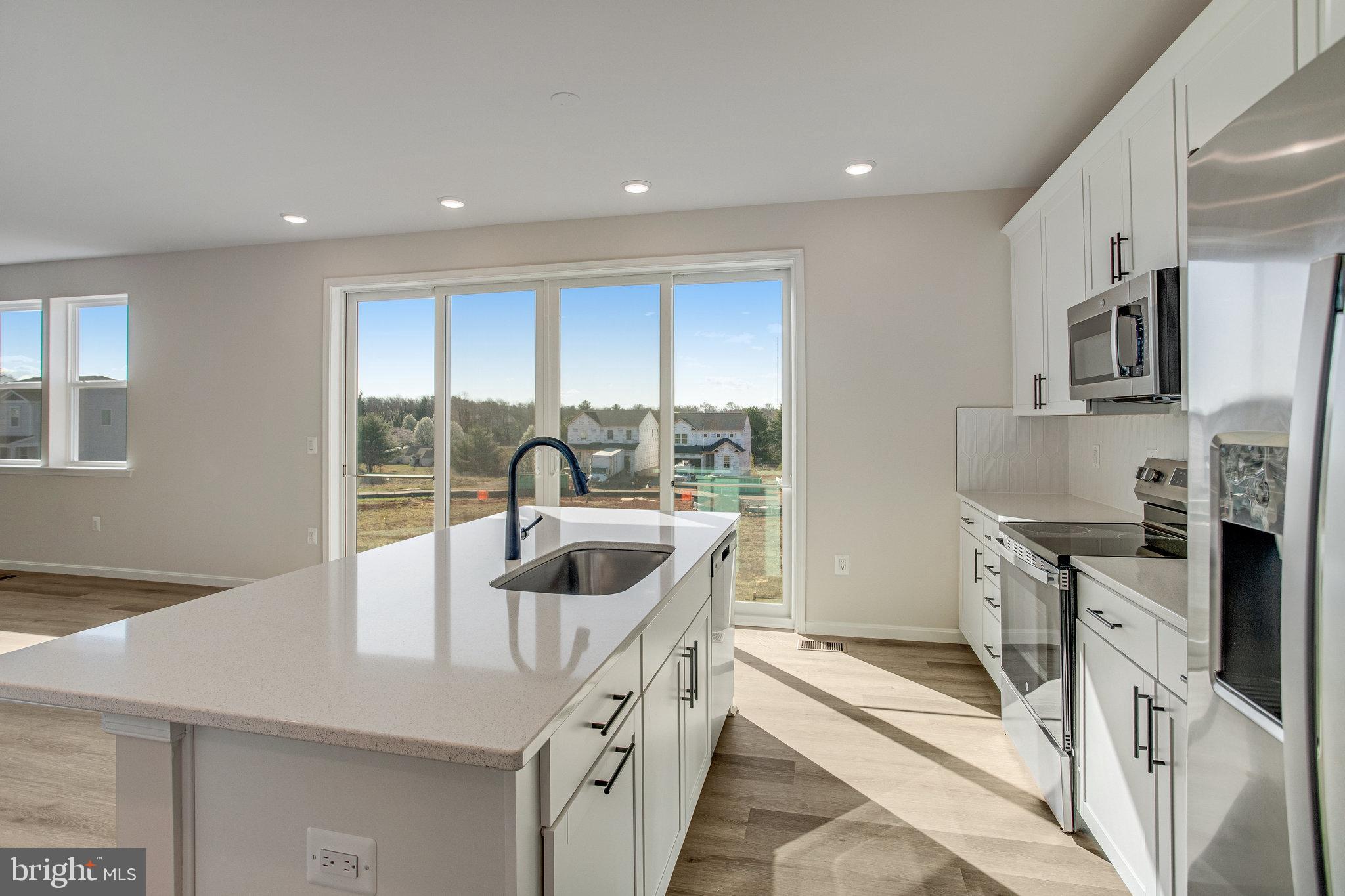 SEASONS AT ROUND MILL MEADOWS - Residential