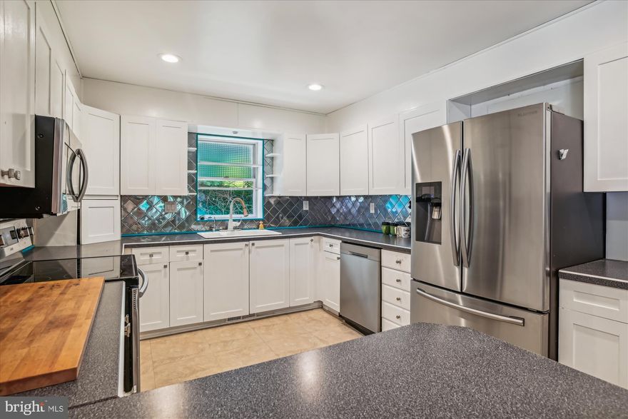 Discover the allure of living just blocks away from the serene Magothy River. This classic Cape St. Claire home offers a perfect blend of comfort and convenience. Proximity to the Magothy River provides easy water access and stunning river vistas. Thoughtfully designed interior spaces in a peaceful neighborhood setting with mature trees.
Five bedrooms and two and a half bathrooms, including a versatile loft space. Attached garage and a delightful screened porch for relaxed outdoor living. Ample driveway parking, a rarity in this sought-after neighborhood.
1152 Pine Tree Drive is ideally situated for enjoying both natural beauty and community amenities.. Explore nearby parks  and convenient shopping options, all within reach.