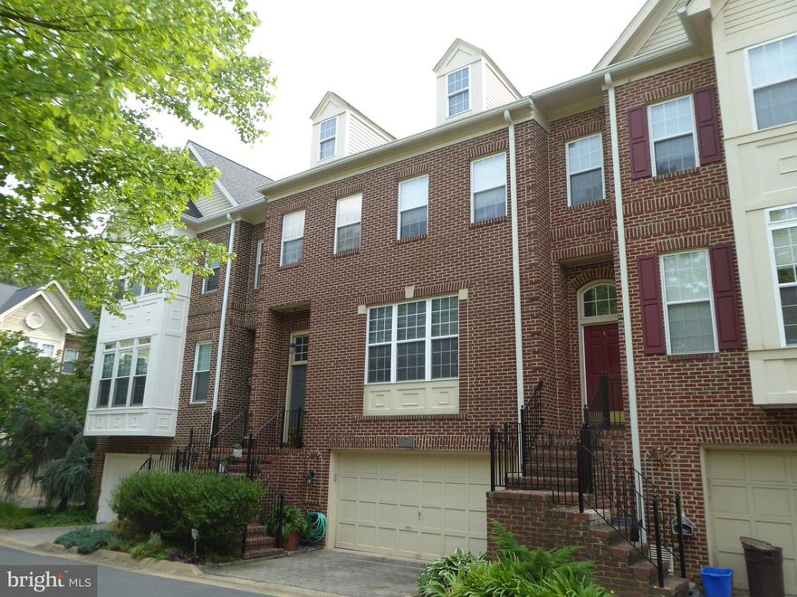 WOW !!! VERY BEAUTIFUL TOWNHOUSE-TWO BLOCKS FROM METRO-TWO CAR GARAGE-RENOVATED-HARDWOOD FLOORS THROUGHOUT-CLOSE TO ROCKVILLE PIKE
PRICE REDUCED $60,000 TO $799,000.00

Upon arriving at Halpine Walk Court, you realize you have just discovered which may be Rockville’s best kept secret enclave of townhomes nestled in an inviting setting providing elements of privacy, convenience, and community worthy of commanding attention. 
A gorgeous brick front townhome approximately two blocks from the “Twinbrook Metro Station”. This beautiful property has hardwood floors on all three levels, recently upgraded bathrooms on the upper level, a new gas fireplace in the rec room / theatre room with projection TV and giant wall screen. The trex deck was just completed. The LED fixtures lighting throughout with conveniently located upgraded outlets with USB charging connections help efficiency. The home has been recently painted in modern soft decorator colors. Many other fine touches have been attended to including door hardware, window treatments, three ceiling fans, and an ultraviolet air purifier for cleaner air. There is a security system that has been installed and can be transferred to the new owner for a reasonable annual fee. The Samsung stainless steel appliances in the kitchen are approximately two years old. The kitchen has a hardwood floor and granite counters with adjacent breakfast area. 
   This very spacious home has high ceilings on the main level and volume ceilings on the upper level. The owner’s bedroom has twin-walk-in closets and a third closet. The primary bathroom has a large shower and a separate soaking tub. 
   The two-car garage has space for two cars and storage for trash and recycling cans as well as an overhead shelf. The rear deck and patio below both provide additional gathering space in the shaded area between the townhome rows. Gutter guards help keep gutter maintenance low.  This property has had many upgrades in the last two years, and it is essentially move in ready.
   This property will delight you and make you happy. Make it yours today!