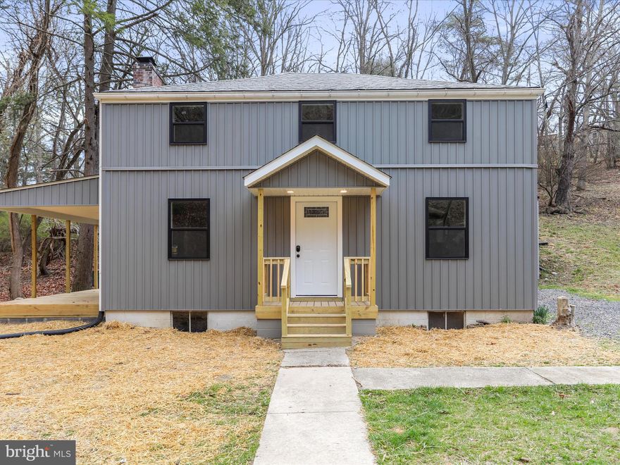 Incredible Value! Completely Renovated Colonial on a Private Corner Lot – Ideal Commuter Location. If you’ve been searching for a move-in-ready home that offers both charm and quality at an unbeatable price, your search ends here. This beautifully renovated two-story Colonial delivers exceptional value with modern upgrades, classic style, and a commuter-friendly location—all at a price you’ll feel great about.
Offering 1,440 square feet of finished living space, this home features 3 bedrooms, 1.5 fully renovated bathrooms, and sits on a generous 0.642-acre corner lot. The layout is both practical and comfortable, and the large unfinished basement provides ample room for storage or future living space. From the outside, you’ll notice the crisp curb appeal thanks to brand-new siding, windows, and roof. Step inside to discover fresh paint, luxury vinyl plank flooring, and a fully updated kitchen featuring new cabinetry, sleek countertops, and stylish fixtures. Enjoy cozy evenings by the fireplace, or relax on the covered side porch overlooking the peaceful, private yard. Additional perks include a brand-new heat pump with central air and a detached one-car garage—perfect for extra storage, a workshop, or keeping an additional vehicle out of the weather. Located just under an hour from Winchester, VA, and Cumberland, MD, this home is ideal for commuters seeking a quiet retreat with easy access to major routes, shopping, and services. This is your opportunity to own a thoughtfully updated mid-century classic without breaking the bank—schedule your showing today and experience the value for yourself!