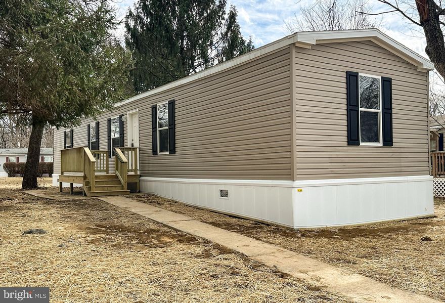 Welcome to 5830 Hilltop Lane! Don't look any further - this home is BRAND NEW and move-in ready for its first owner! Many, many upgrades throughout including new front and back decks and a new central AC unit. Additionally, this home has brand-new insulated skirting ideal for reducing heating and cooling costs during those hot summer days and cold winter temperatures. The generous-sized living area boasts an open floor concept adjoining to the kitchen making hosting friends and family an absolute delight. This 3 bedroom 2 bathroom home is located in Stoneyhill Community - an all age community in Lancaster county. Situated on a serene open lot, enjoy the tranquility that the outdoor space has to offer. Don't wait, schedule your showing today so you don't miss out on this absolute gem of a home! *All buyers must be approved by the community through an application process.