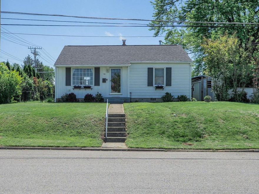 SHOWINGS START MONDAY, 5/11/26. Situated on a nicely landscaped corner lot, this charming home offers convenient  front street parking along with a rear driveway and carport for additional off-street parking. Enjoy outdoor living on the spacious 26 x 12 roof covered rear deck overlooking the fenced backyard--perfect for relaxing or entertaining.  Inside, the home features numerous updates over the years including but not limited to the kitchen, bath, roof, gutters downspouts, and replacement windows. Recently luxury vinyl flooring was added throughout the entire home, adding a fresh and modern touch.  The large eat-in kitchen provides plenty of space for cooking and gathering, complete with gas cooking. Cozy gas heat adds comfort and efficiency during cooler months. Additional storage is available with pull-down attic steps and partial wood flooring in the attic area. Conveniently located near MARC and Amtrak service, as well as the main gate to APG, this home offers excellent commuter access while maintaining the comfort of a well-kept residential setting.