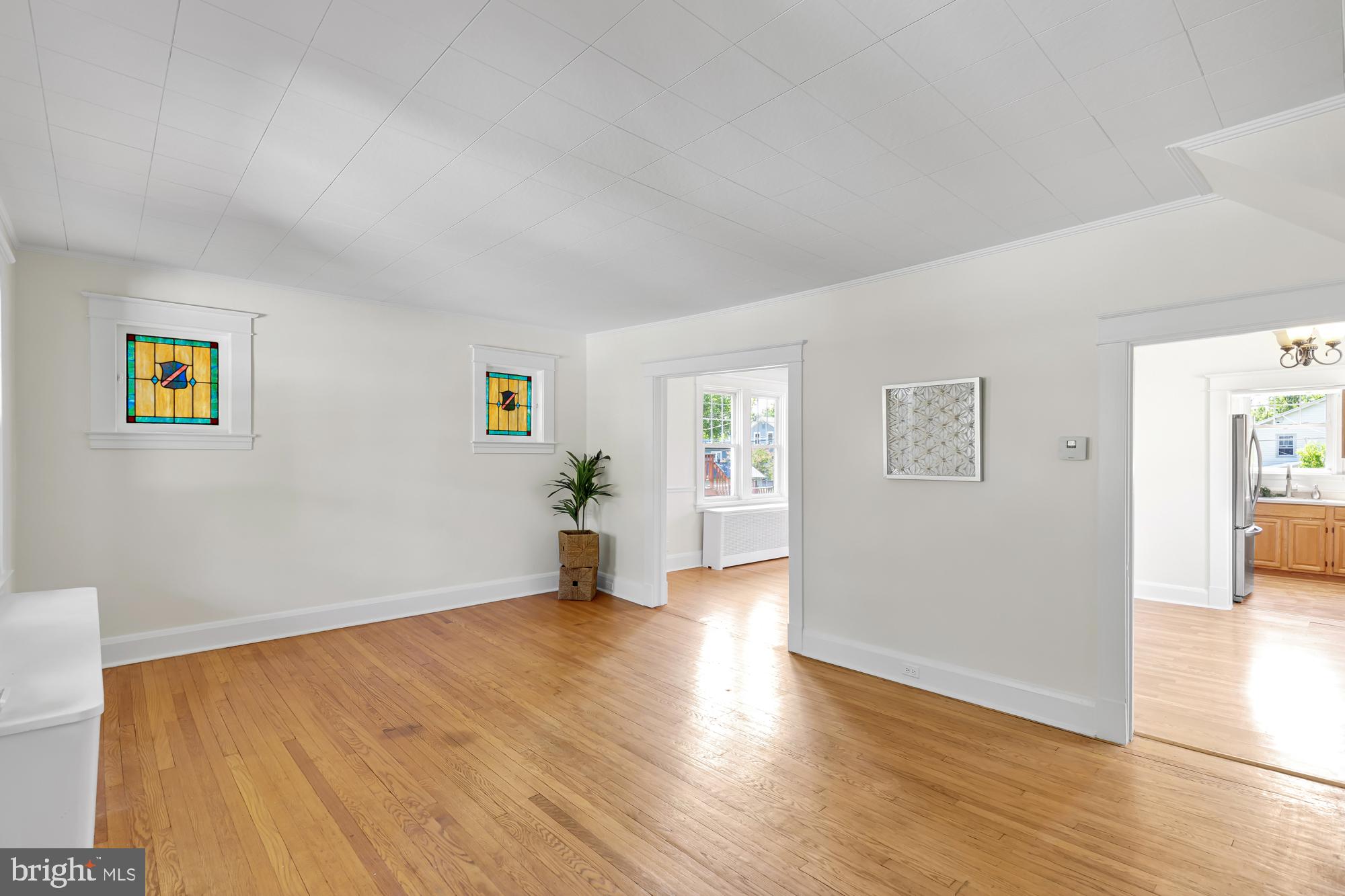 OFFER DEADLINE: Thursday, Sept 7th at 12pm
Nestled in the Beverly Hills neighborhood, this delightful detached home exudes timeless charm and character. Recently adorned with fresh paint, both inside and out, this residence welcomes you with open arms. Its generous front yard, extended driveway, and inviting front porch offer the perfect space for outdoor enjoyment. The main level is bathed in natural light, featuring a seamless flow from the front living area to the dining room and a second living space. The well-appointed kitchen boasts a gas stove and a stainless steel refrigerator. Upstairs, three bedrooms adorned with ceiling fans await, accompanied by a full bathroom and hallway storage closet. A second full bathroom can be found on the lower level. Step outside to discover a spacious, flat, and fenced backyard, complete with a detached one-car garage. This charming home is move-in ready - call it yours in time to enjoy hot apple cider on the front porch this fall!