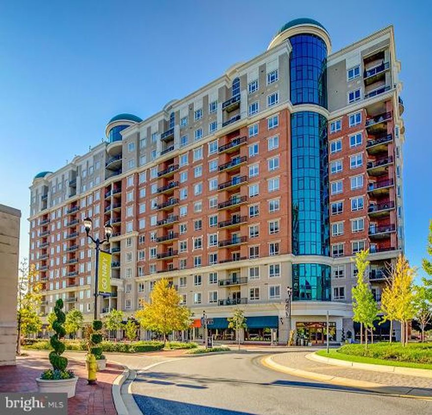 Stunning and fabulous at the GrandView! This much desired, "Davenport" unit on the 5th floor features 2 BR, 2 BA, Den, 10 ft ceilings, open living/dining floor space, granite counters,  balcony, and more. Amenities incl. assigned garage parking, concierge, fitness center, rooftop pool and entertainment areas.  Walk to the best of the Annapolis Towne Centre - Whole Foods, Target, Restaurants, etc.