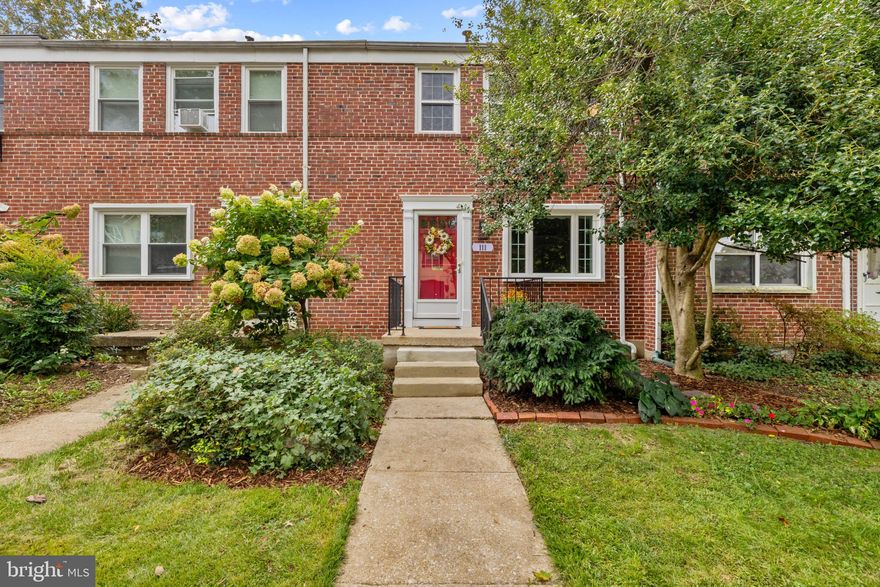 Charming brick townhouse residence offering 3 bedrooms, 1 full bathroom, and 1,516 finished square feet in welcoming Burma. Step inside the traditional main level where gleaming floors flow throughout a spacious living room featuring charming built-ins, seamlessly opening to the formal dining room. The cozy eat-in kitchen is equipped with stainless steel appliances, abundant cabinet and counter space, and a convenient breakfast bar for casual stool seating, along with direct access to the backyard. Upstairs, beautiful flooring continues into three inviting bedrooms, including a generous primary suite. Each room is outfitted with a ceiling fan for year-round comfort. The centrally located hallway bathroom showcases timeless black-and-white design details, from elegant wall tile to classic checkerboard flooring. The walk-up lower level offers a versatile recreation room—perfect for a game room or lounge, complete with built-ins for added storage. A large partially finished storage room provides laundry facilities. Outside, enjoy a private fenced backyard with a patio ideal for outdoor dining, a storage shed, and luscious landscaping. New carpet, new microwave, new dishwasher! newer lifetime warranty for windows, newer HVAC  Washer/ Dryer and the list goes on.