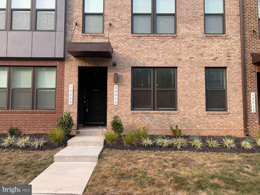 One year old Stanley Martin townhome-style garage condo within walking distance to the silver line metro! Penthouse-style living!  Welcome to The Cavendish 2-level garage condo at Ashburn Station! Step into this 2,462 sq ft home and be greeted by the main level's open floor plan, seamlessly connecting the kitchen, dining area, family room, powder room, and a fabulous deck. Perfect home for hosting  dinner parties and holiday gatherings in this elegant space. Large primary bedroom with its spaciousness, charming sitting area, and en suite bathroom, you'll find yourself escaping to this private retreat after a long day.  In addition to the primary bedroom, you will find two more generously sized bedrooms on the upper level, along with a convenient hall bath. This ample space ensures everyone's privacy and comfort. Located in a vibrant and thriving community, The Cavendish Condo is just moments away from top-rated schools, trendy shops, delicious dining options, and the convenience of major highways for easy commuting. Ashburn Station within walking distance of the silver line Metro in Northern Virginia. This neighborhood offers an ideal location close to major commuting routes and some of the area's largest employers. Enjoy amenities dispersed throughout this new neighborhood including a gaming lawn, 2 workout stations, a playground, and multiple community parks featuring greenspace, firepit, grilling station, and outdoor seating. This location is a short walk or quick drive to the many shopping, dining and entertainment options throughout central Loudoun County. Ashburn Station is an ideal choice for residents who want to work and play close to home.