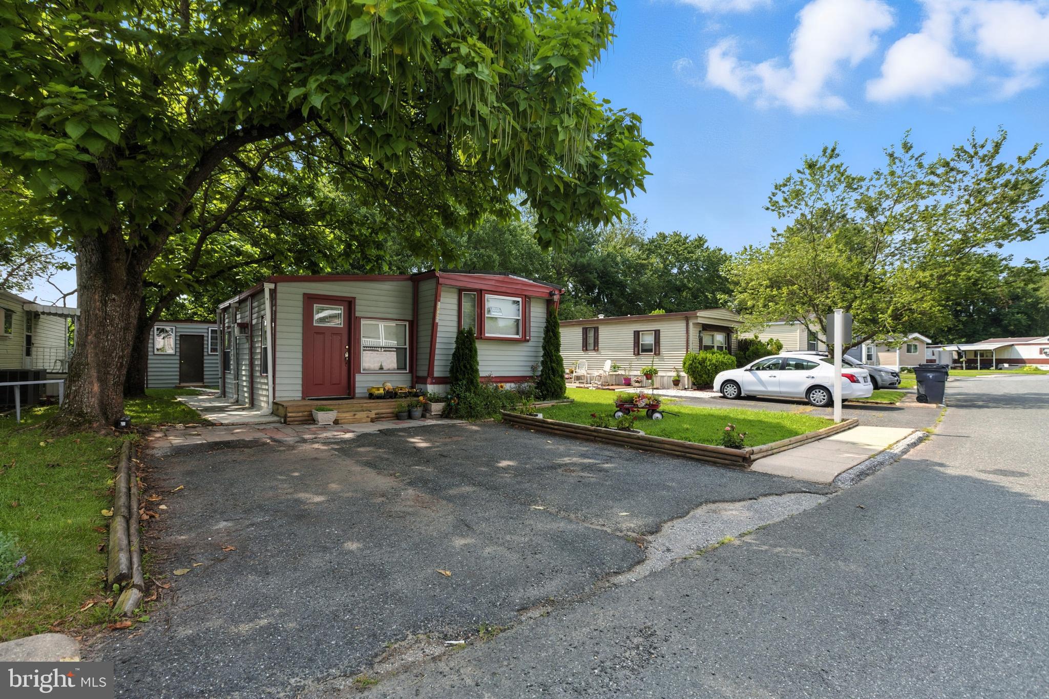 Beautifully Updated 2BR/2BA Mobile Home – Move-In Ready!
Nicely appointed and well-maintained mobile home featuring 2 bedrooms and 2 full bathrooms. Upgrades include cherry hardwood floors, recessed lighting, crown molding, and wood frame windows. Spacious owner’s suite with a 38x46 shower stall and mirrored closet doors.
The kitchen offers granite countertops, tile backsplash, deep sink (2023), cherry cabinets, and stainless steel appliances including stove, built-in microwave, side-by-side refrigerator, and dishwasher. Bay window adds natural light and charm. Dining space in kitchen.
Living room features high ceilings, ceiling fan, and an electric fireplace with remote. Other highlights: mini split HVAC, 5” baseboards, updated molding, washer/dryer, and a new electric panel with full rewiring (2023). New toilets (2024), smoke detectors, and front/back doors.
Exterior amenities include a new back deck (2024), 10x10 shed (8 ft high), 2-car driveway, concrete walkways, patio paver (10x13), and enclosed porch with A/C unit. Insulated undercarriage (3/8" plywood) and upgraded insulation (2020).
Community ground rent: $803/month, includes trash pickup, sewer, snow removal, and recycling. Community swimming pool and clubhouse available for party rentals.