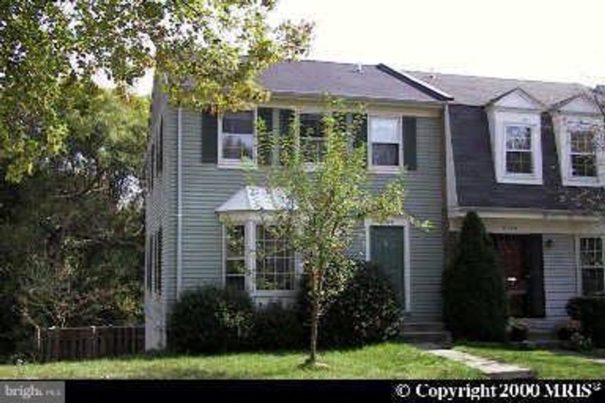 Renovated 3 finished End unit Townhome.  Back to Trees. New hardwood floor throughout.  Living rm w/bay window.  Dining rm w/French door to Deck overlooking Trees. New kitchen w/granite countertops, upgraded appliances & cabinets. All new baths w/ceramic tiles.  Spacious Master BR w/full bath.  Fin. basement w/cozy wood burning fireplace, large storage area, FBA & walkout to fenced yard.