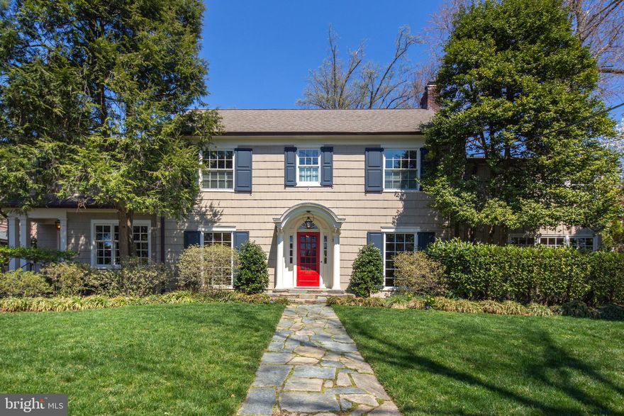 Welcome to a beautifully updated and gracious Wesley Heights colonial sited on an enviable lot near the top of Foxhall Road. Understated elegance is a theme of this surprisingly large home with plenty of space for all types of entertaining: formal dinners, relaxed family gatherings, or garden and pool parties. The main level provides a foyer/entrance hall, living room with fireplace, family room with built-in shelving and a wet bar, powder room, dining room, breakfast room, and kitchen that opens to a sitting/study room. The custom kitchen includes a center island with breakfast bar, professional grade stainless appliances, and marble countertops, and a side entrance. A sunroom/gallery at the back of the house connects the main rooms to the garden and terrace and provides access to the lower level. The home's second level offers five bedrooms and four full baths plus a home office and laundry closet. The master suite area has a private balcony overlooking the garden, walk-in closet, and a spa-like bath with Waterworks fixtures, double vanity, separate shower and soaking tub. The top floor has as two additional bedrooms with a newer full bath. The lower level is currently used as a playroom and has a powder room, wine room, laundry room, and storage room. Behind the house is a large, fenced, private garden with swimming pool, patio and terrace space, and an outdoor kitchen with grill and refrigerator. The detached, oversized garage, built to accommodate a car lift, also offers a half bath to serve as a pool changing room.