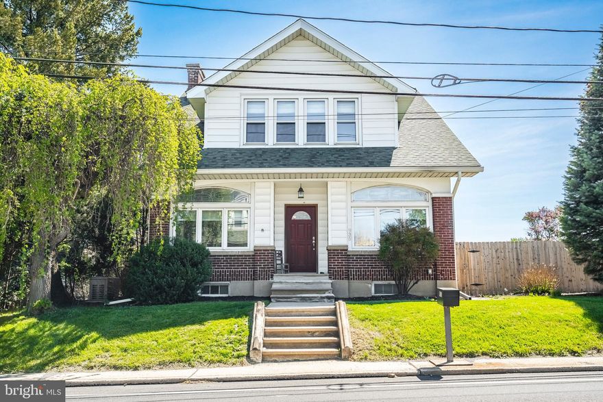 Welcome home to this Charming Craftsman-Style Home, where Timeless Old-World Craftsmanship meets Warm, Inviting Character. This Lovely East Penn S.D. Home Offers a Perfect Blend of Historic Elegance & Modern Comfort, Creating a Truly Special Living Experience. Beautiful Refinished Inlay Hardwood Floors in Living Rm & Dining Rm. Charming Stainglass Windows & Brick Gas Fireplace add a Touch of Artistry to the Home. Modern Kitchen w/Corian Counter Tops & Gas Stove opens to Beautiful Wood Vaulted Ceiling Sunroom/Breakfast Room w/Exposed Brick Walls. Newer Roof (2020) w/6 Inch Gutters (2021). Entire Home was Rewired w/New Electric & Added Gas Generator for Entire Home. Electric Hookup for a Hot Tub. Newer Gas Hot Water Heater (2021). Large Enclosed Front Porch w/Electric Baseboard Heat, Newer Windows & Custom Built Shades (Used as an Office). Half Bath on 1st Floor w/Additional Rm(Could be Office/Playroom). Second Floor has Large Main Bedrm w/Walk-in Closet. Two more Nice Sized Bedrms both w/Walk-In Closets. Updated Main Bathrm. Added Room off Bathrm w/Built-in Wood Drawers. Additional Large Hall Walk-In Closet-Home has a Ton of Closet Space! Full Basement w/Door to Outside. Detached Oversized 2 Car Garage w/Additional Parking Pad for 4-6 More Cars & 2 Sheds. Enjoy the Lovely Landscaped Yard Providing a Peaceful Outdoor Retreat. Well & Public Sewer. Zoned Commerical-Could Have In Home Business. Great Location-Convenient to Major Routes 78/309/22/222; Shopping, Schools & Parks.