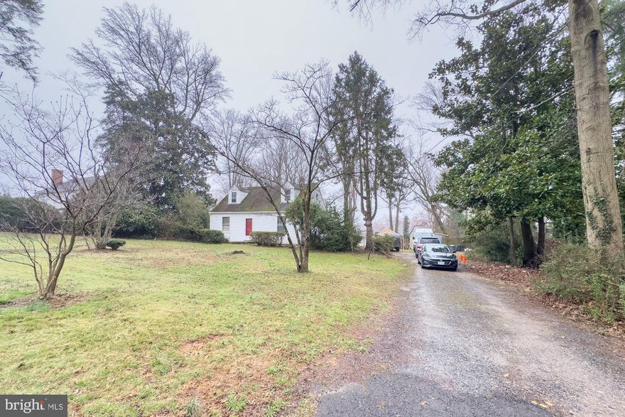 1 acre level grassy lot.   Public Water & Sewer.  Gas available but verify with Washington Gas. 5 min to 395, 495, 15 min to the Pentagon, 20 min to Reagan National Airport, 20 min to Old Towne Alexandria Water front. This home does NOT have an HOA, and SOOO MUCH LAND  for you to enjoy, build addition to add value, or simply wait for the value to quickly rise  HURRY!