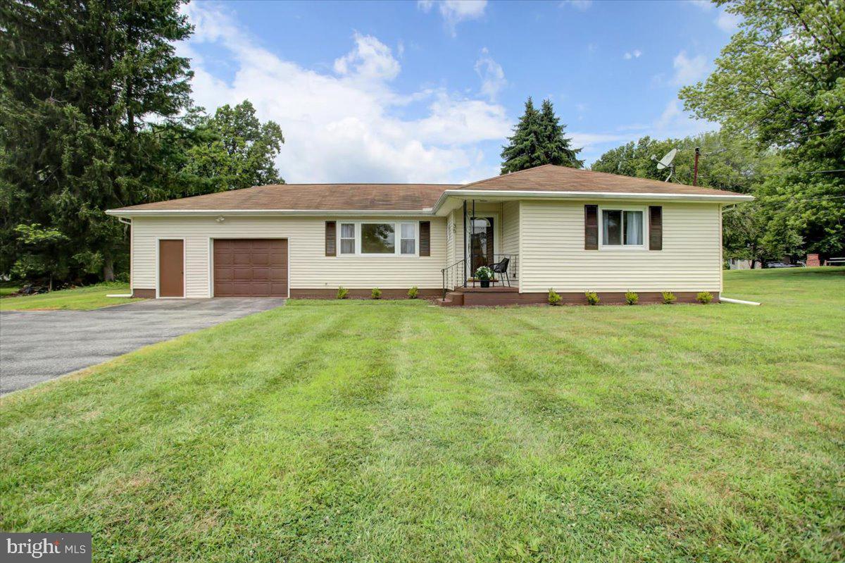 Price adjustment!! Welcome to this beautifully updated home in the heart of Fairfield, PA—offering small-town charm, modern conveniences, and exceptional build quality. Set on a level lot with public water and sewer (yes, public!), this single-level rancher provides easy, comfortable living just minutes from Liberty Mountain Resort, Carroll Valley Park, historic Gettysburg, and Rt. 15 for convenient commuting.
Built with true craftsmanship, this home features solid wood construction—no plywood here! The freshly painted exterior and completely repainted interior create a clean, move-in ready feel. The updated kitchen offers painted cabinetry, quartz countertops, new lighting, durable laminate flooring, and a bar-height seating area that opens seamlessly to the dining room and spacious living room, highlighted by a cozy gas fireplace. Warm hardwood floors flow throughout the main living areas, enhancing the home’s inviting character.
The full bathroom has been thoughtfully renovated with a dual vanity, a brand-new walk-in shower, and a handicap-accessible tub for added comfort and versatility. Updated windows fill the home with natural light, creating a bright, welcoming atmosphere.
Off the attached oversized one-car garage, you’ll find an enclosed sunroom—a peaceful three-season retreat overlooking the backyard. A separate storage shed provides extra space for tools and equipment. Additional features include updated electric, natural gas hot water baseboard heat, central AC for year-round comfort, and a full unfinished basement ready for future expansion or storage.
With its solid construction, modern updates, public utilities, and a prime location just one road over from the scenic entrance to Liberty Mountain Resort, this Fairfield gem is truly ready to welcome you home.