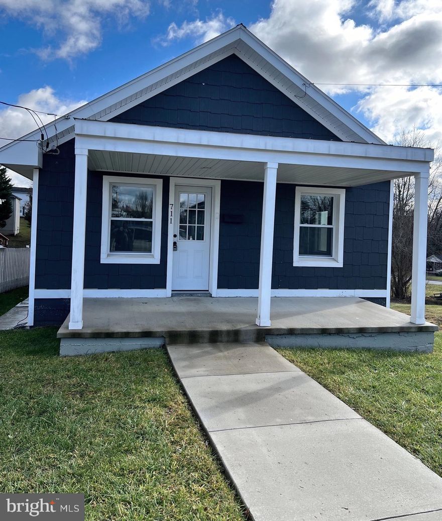 Back on the market and ready to sell!  This lovely home is close to downtown Martinsburg and is situated in an up-and-coming area.  This home was recently fully renovated by the owner with a new master suite and a new large outside deck. This would be a great home for a first time homeowner or could be a great investment for an investor. This modernized rancher has a welcoming covered porch and a 0.19 acre back yard.  This energy-efficient space has all new windows, and a mini-split heating and cooling unit, as well as a natural gas furnace system. The new vinyl plank flooring is throughout the entire space, and both bathrooms are upgraded . The main bedroom suite has a washer and dryer hookup and an adjoining bathroom.  The large outdoor deck can be entered from the main bedroom suite.  There are two designated parking spaces in the rear of the yard that is next to the alley street.  This modern newly-renovated rancher is a must see! Listing agent related to seller.