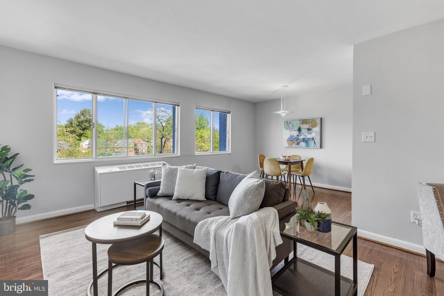 Beautiful 1-bedroom, 1-bathroom third-floor home in Stratton House Condominium! A spacious & bright living room welcomes you with large windows & gleaming hardwood floors, creating an inviting space for both relaxing & entertaining. The separate dining area is accented by a pendant light. The updated kitchen is both stylish and functional, featuring soft-close white cabinetry with modern pulls, tile flooring, a subway tile backsplash, stainless steel appliances, quartz countertops, a pantry closet, & overhead lighting. A hallway with a large storage/linen closet adds convenient everyday functionality. The bathroom includes tile flooring, an updated vanity, a large medicine cabinet mirror, & a tiled shower with corner shelving. The light-filled bedroom offers plush carpeting, overhead lighting, & two closets, including a walk-in closet for ample storage.

The condo fee includes ALL utilities, offering exceptional value, and this home also comes with a separate storage unit & access to a common laundry room. Enjoy a variety of community amenities, including an outdoor pool, picnic tables & grills, a play area, an outdoor fireplace, & two high-speed EV chargers. Tucked on a quiet street yet just steps to restaurants and shops, this location offers the best of both worlds. Conveniently located just a quick 5-minute drive to I-395 and close to the Ballston Metro & the Columbia Pike corridor with endless dining & entertainment options nearby!