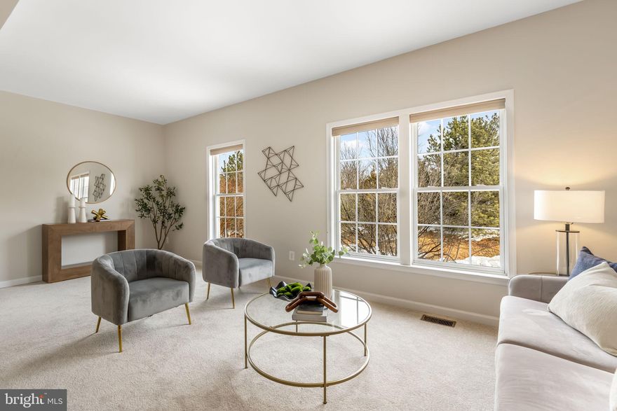 Leesburg/Lansdowne.  This 3-story brick townhouse offers easy, flexible living with plenty of room for gathering, entertaining, and everyday life. Tucked along a quiet street, this stately home welcomes you with a gracious entry and a layout that truly works.The main living level is bright and open, anchored by a spacious living room with space to carve out a small study or reading nook. The kitchen sits at the heart of the home, featuring stainless steel appliances, generous counter seating, and space for a dining table, with easy access to the large Trex deck—perfect for al fresco dinners and weekend grilling.The upper level offers 3 bedrooms and 2 full baths including the en suite primary with a spacious walk-in closet.The lower level opens to a comfortable family room—ideal for movie nights, play space, or hosting friends—with direct walk-out access to the fenced backyard. A thoughtfully organized laundry room with washer and dryer and access to the one-car garage round out this level.Outside, the deck and fenced yard offers room to relax and play. The Lansdowne community adds miles of walking and biking trails, neighborhood amenities, and easy access to Route 7 and the Toll Road.Well-designed space, a smart layout, and a setting that makes everyday living easy—this is a home you’ll be proud to call your own.