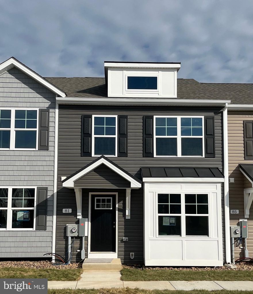 Under Construction.  3 bedroom, 2.5 bath 2-Story town homes featuring spacious room sizes, luxury vinyl plank flooring in main living areas, Bump out in main level family room, and kitchen with island, granite countertops, and pantry.  The Primary Bedroom has walk in closet and full bath with double vanity and tile shower w/ glass door.   All homes come with natural gas heating system and brick accents on front.   10x12 Rear deck included and builder pays 3% closing assistance.  Photos are similar construction