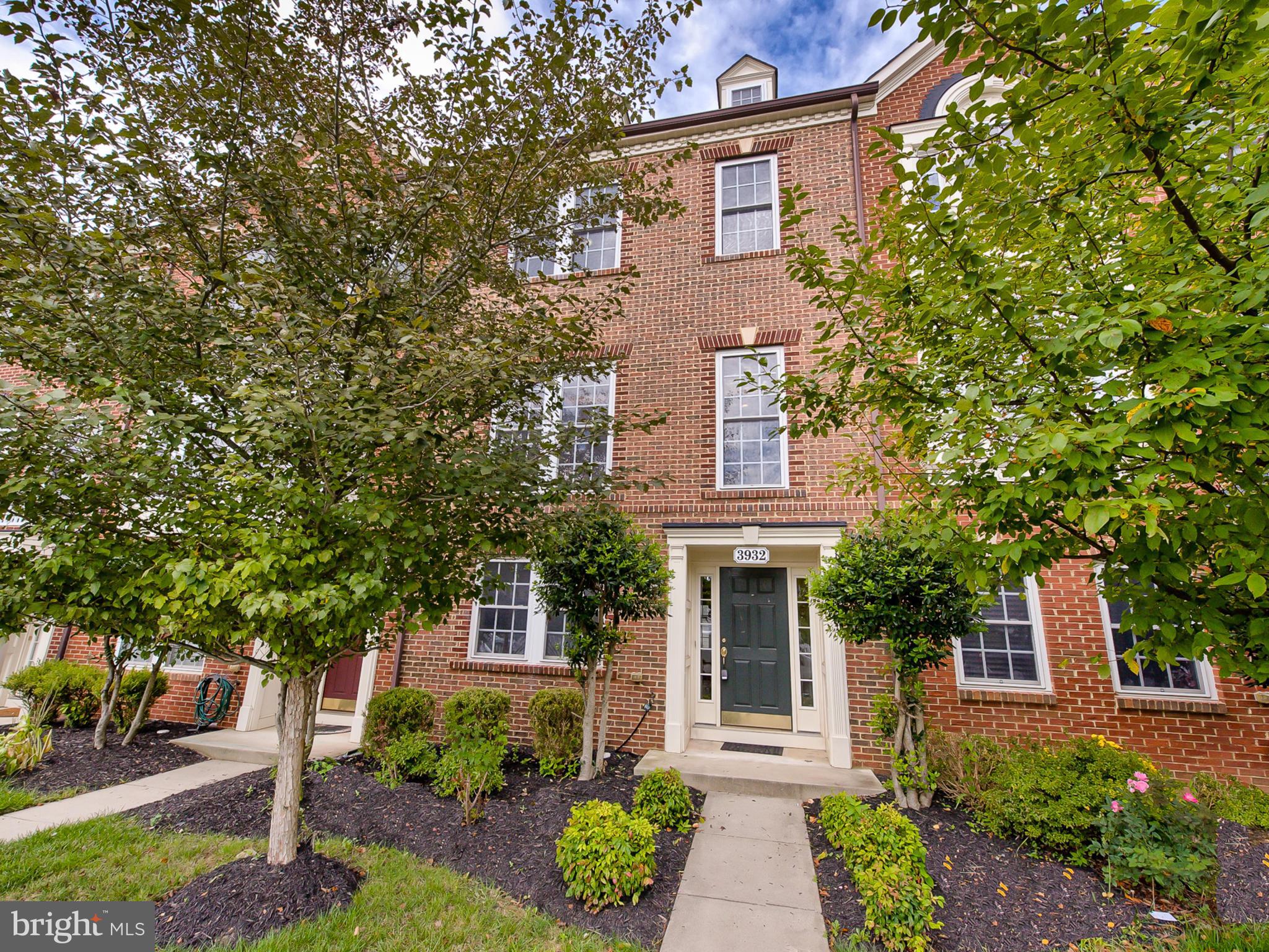 Beautiful NV brick front townhome shows like a model! Freshly painted w/gleaming hardwood floors on 2nd/3rd levels. Gourmet kitchen: huge island, tile backsplash, SS appliances, 3-level bump-out! Lg deck for entertaining overlooks flat, fenced yard. Lovely Master ste w/sitting area, spa bath & 2 walk-ins! Spacious lower lev: full bath, living area w/fireplace, bonus rm. Walk to resort style pool!