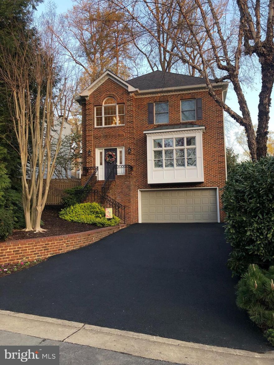 Welcome to serenity in a prime McLean location.  This Georgetown colonial home is located on a peaceful street within walking distance to McLean central park, trails, library, community center and downtown McLean. Some prominent features include a 2-story foyer, inlaid wood floors, beautiful stone fireplace, spacious primary bathroom and walk-in closet, recreation room with brick fireplace, wet bar, and walkout flagstone patio. The home has been well maintained with renovated bathrooms and upgraded roof and siding. Perhaps the feature you’ll enjoy most is the screened-in porch where you can relax in an outdoor retreat