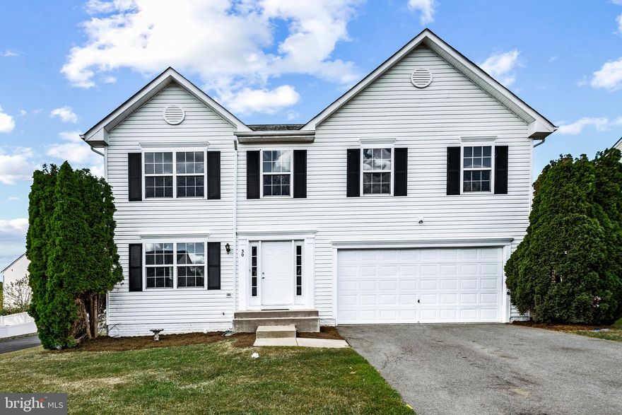 Price Improvement! Located in the sought‑after England Run North community, this refreshed 4‑bedroom Colonial blends timeless charm with modern upgrades. Step inside to find fresh paint and updated flooring throughout, creating a bright, inviting atmosphere. The open main level offers a spacious living room, dining area, and a fully modernized kitchen with new countertops and appliances. A relaxed family room with fireplace provides the perfect spot to unwind, while a versatile bonus room—ideal for a home office, guest space, or playroom—and a powder room complete the main floor. Upstairs, the expansive 35‑foot primary suite serves as a private retreat with a jetted tub and en‑suite bath. Three additional bedrooms share a hall bath, all supported by a dual‑zone HVAC system for year‑round comfort. Offering generous storage and flexible space, the full basement is ready to be tailored into a gym, media room, workshop, or studio. A two‑car garage, ample driveway, and on‑street parking enhance convenience. Residents enjoy community amenities including a clubhouse, outdoor pool, and well‑kept common areas. With nearby parks, Stafford County schools, shopping, and easy access to major routes, this home offers both comfort and connectivity.