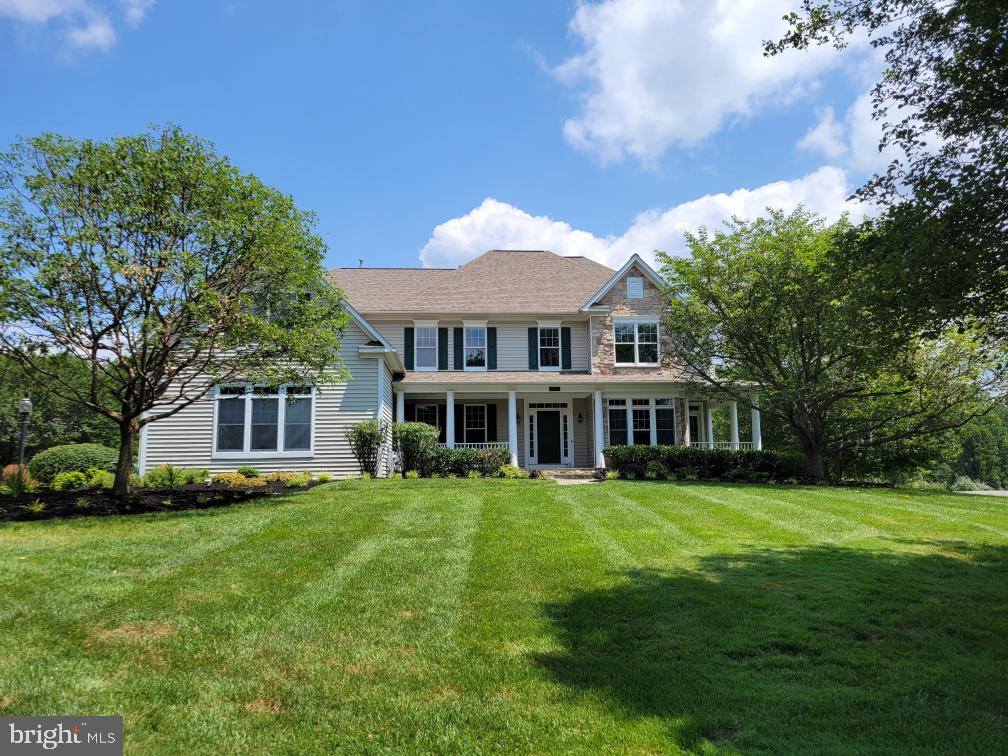 WELCOME TO THE COVETED CATTAIL CREEK GOLF COMMUNITY! THIS LUXURY 5BR/6FBA COLONIAL IS PERFECTLY SITUATED AT THE END OF A CUL-DE-SAC ON A ONE ACRE LOT. CHARMING WRAP-AROUND PORCH LEADS YOU INTO A GRAND OPEN FOYER WITH FORMAL DINING ROOM AND LIVING ROOM ON EITHER SIDE. FEATURES INCLUDE; HARDWOODS FLOORS THROUGHOUT/9 FT CEILINGS/CROWN MOLDING. EXPANSIVE KITCHEN INCLUDES; MAPLE CABINETS, LARGE L SHAPED ISLAND TO COMFORTABLY SEAT 8, BREAKFAST ROOM, BEVERAGE BAR, AND PLANNING DESK. ADJACENT COZY FAMILY ROOM BOASTS A 2 SIDED-FIREPLACE. ADDITIONAL MAIN FLOOR AMENITIES INCLUDE; OFFICE AND LAUNDRY ROOM AS WELL AS A FULL BATHROOM WITH CUSTOM STAIN GLASS WINDOW. UPSTAIRS, THE PRIMARY SUITE FEATURES SITTING AREA, WALK-IN CLOSET, 2-SIDED FIREPLACE, AND LIGHT FILLED EN-SUITE BATH WITH JETTED TUB. FOUR ADDITIONAL SPACIOUS BEDROOMS ALL WITH BATHROOMS COMPLETE THE UPPER LEVEL. CONVENIENT UPSTAIRS LAUNDRY CHUTE. FULLY FINISHED WALK-OUT LOWER LEVEL WITH 2 FULL LENGTH WINDOWS AND MULTIPLE ENTERTAINING AREAS INCLUDING; BAR, CUSTOM BUILT-INS, GAME ROOM, THEATER, GYM AND FULL BATH WITH FRAME-LESS SHOWER. LARGE DECK WITH SCREENED IN PORCH AND AL FRESCO AREA BACKING TO SERENE WOOD LINE SETTING. ADJACENT TO CATTAIL CREEK COUNTRY CLUB. WHOLE HOUSE STANDBY GENERATOR. UPDATES INCLUDE; NEW HVAC 2021, NEW SUMP PUMP 2023, UPDATED WATER TREATMENT SYSTEM INCLUDING WATER SOFTENER 2023, NEW ROOF 2019, NEW DISHWASHER 2024, NEW REFRIGERATORS X 2, 2020.