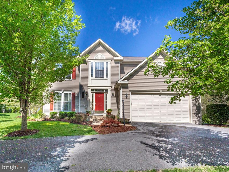 Beautiful Inside & Out.  Sits Back off of Street and Backs to Woods for Privacy.  Walk into an Amazing Main Level with a Sitting Room, Living Room, Formal Dining Room and a Kitchen you won't want to leave.  Kitchen Featuring Granite Counter Tops, Stainless Steel Jenair & Thermador Appliances.  Custom Paint & Trim Throughout this 4 Bedroom, 3.5 Bath House.  Hardwood Floors on the Main & 3rd Floors.  Partially Finished Basement with Room for a Pool Table, Play Room, Home Office Whatever Your Needs Are.  2 Car Attached Garage and a Large Deck Looking out to the Woods Providing You Privacy to Enjoy Your Beautiful Yard.  You Won't Be Disappointed.  Close to Restaurants, Shopping & Public Transportation.