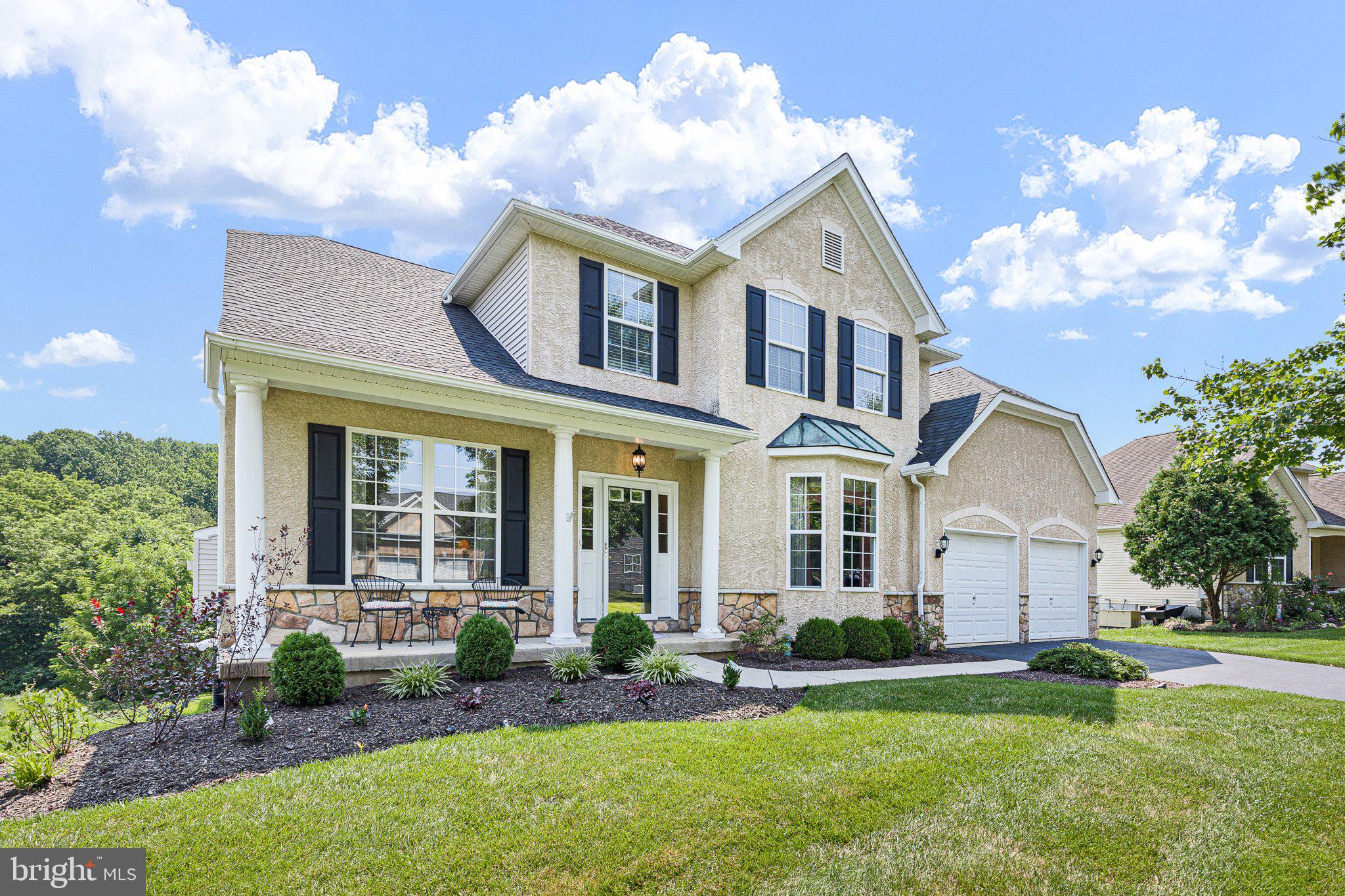 Welcome to your dream home in the highly sought-after, active 55+ community of Traditions at Inniscrone! This stunning property offers a wealth of luxurious features and an unbeatable location. The formal living room boasts crown molding and a lovely view of the front yard. Adjacent to the living room, the elegant dining room also features crown molding and a bay window. The family room has two story ceilings, new carpet, and provides a cozy ambiance with a gas fireplace as the focal point. Step out onto the low maintenance composite deck with an awning to enjoy the wooded open space and large private yard. The updated kitchen features granite countertops, stainless-steel appliances, and a Bosch dishwasher. The main floor primary bedroom offers hardwood floors, a vaulted ceiling, and a walk-in closet. The en suite bathroom includes a double vanity, soaking tub, and glass-enclosed shower. Upstairs, find a loft area, a second bedroom, and a full bathroom. The finished basement features a bar, TV/game room, theater room, patio access, half bathroom, workshop, small office, and storage. The home also includes a whole house generator and newer roof, hot water heater, and HVAC. The neighborhood is perfect for low maintenance living and has a club house with a pool. Welcome Home!