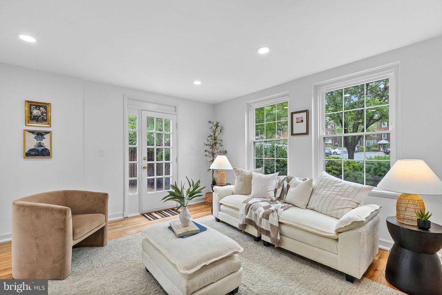 Rare, coveted Dominion II model END-UNIT located in sought-after Fairlington Villages. Two bedrooms and bathroom on the Upper Level, plus a  den/office/bedroom and bathroom on the Lower Level. This large, 1,689 square foot, three-level home showcases $90,000 worth of renovations that make this a turnkey home. This sun-soaked end unit features NEW hardwood flooring in the Primary Bedroom, as well as REFINISHED hardwood floors on the Second Bedroom, Upper Level Hallway, and Main Levels, NEW Luxury Vinyl Tile on the Lower Level, UPGRADED granite kitchen countertops, NEW kitchen appliances, a fully UPDATED bathroom, as well as ALL NEW windows and storm doors! NEWLY installed recessed lighting on the Main and Lower Levels creates a modern look and complements the ample natural light well. FRESH paint throughout. WALK-OUT basement lends itself to ease of entry, abundant natural light, and STORAGE. Outdoor space includes LARGE patio with NEW fencing, as well as mature landscaping that shows pride in ownership. Azaleas, roses, hydrangeas, tulips, daffodils, and hyacinths increase curb appeal and make this unit into more than just a place to live. Parking is a breeze in Lot #41, with more than enough spaces. Listed on the National Register of Historic Places, Fairlington has more than just its past to offer, boasting community features such as the neighborhood pool, tennis and basketball courts, playground, and even its very own (and very popular) Farmers Market, which are all conveniently situated steps away from this unit. Fairlington Villages has a strong sense of community, with events like wine and cheese tastings, Easter Egg Hunts, parades, holiday parties, and more! The surrounding area has a lot to offer as well. Shirlington Village is only a mile away, which means easy access to shopping, whether at a boutique store or at Harris Teeter, local dining, such as Busboys and Poets, Astro Beer Hall, Our Mom Eugenia, and Taco Bamba, as well as great entertainment options such as the Signature Theatre and AMC Shirlington 7.  For those who love the outdoors, there are plenty of options, including the W&OD Trail, Shirlington Dog Park, and Jennie Dean Park. Travel is easy with close access to commuter routes, Metrobus just 0.2 miles away, and King Street Metro only 3 miles away. Live where you can be comfortable at home, in your community, and beyond.