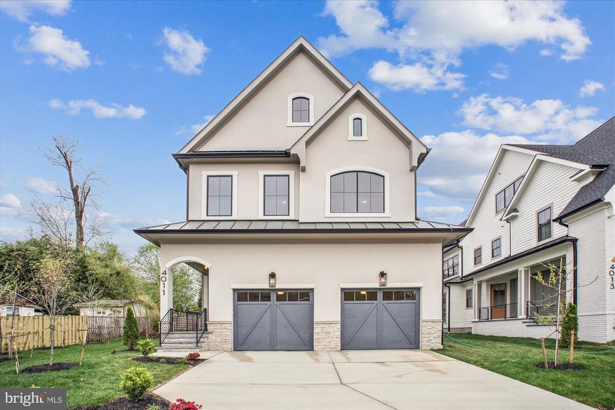 ONLY ONE LEFT! The Pinta (Lot 2) STILL ABLE TO CUSTOMIZE THE INTERIOR FINISHES WITH A 2 MONTH DELIVERY!!! 

Introducing THE NINA: This stunning residence boasts 5 bedrooms, 2 dens, 5 bathrooms, and 1 half bath. Upon entering, you'll immediately appreciate the luxurious boutique finishes and selections throughout. The kitchen is a true masterpiece, featuring beautiful Cali White Oak hardwood flooring, warm wood and designer off-white cabinetry, quartz countertops with a waterfall island, stainless steel Bosch appliances, a striking marble backsplash, elegant bowtie pendant lighting, a custom hood, and multiple layers of accent lighting that elevate the space.

The first level showcases a gas fireplace adorned with book-matched slabs and wood beams, serving as a captivating focal point for the family room. Floor-to-ceiling Marvin windows allow natural light to flood the area, creating a sophisticated ambiance. Experience unparalleled comfort with the innovative hydronically heated floors throughout the lower level, complemented by a linear fireplace, furnace and AC with Ecobee thermostats. The open floor plan seamlessly connects the kitchen, dining area, and family room, providing an ideal space for gatherings. For those needing a main level office, this home has you covered. Each room in this home provides a truly exceptional experience. Large french doors open to a covered, tiled loggia with large fan and recessed lights is perfect for cookouts while avoiding direct sun overheat. The double garage features a Polyaspartic floor treatment and a convenient mudroom drop zone. 

The Primary Bdr. on the upper level is uniquely designed with custom accent fluted panels, a chandelier, and a balcony great for those morning coffee & two expansive customized closets. Prepare to be captivated by the stunning master bathroom, which features a curb-less shower with two shower heads and a handheld option, spacious niches, and a bench. Additional highlights of the master bath include custom vanities with USB/USC ports, strategically placed outlets for hair dryers, programmable heated floors, and a jacuzzi with light therapy for a spa-like experience.

The second upper level offers ample space for a game room, additional office, kids' or teen area, or a workout/meditation space. Even the storage areas are thoughtfully finished with designer carpeting and high-quality padding. The lower-level bedroom and bathroom make it easy to accommodate family or guests comfortably.

This smart home includes advanced features such as a camera doorbell, smart Yale front door lock, programmable garage door openers, professional speakers, and smart light switches, all controllable via an integrated iPad panel (iPad not included). The Nina is an ACG premium custom home, ensuring top-notch craftsmanship with peace of mind, alongside a 1 and 10-year warranty backed by a reputable national warranty company. 

The Reserve at Virginia Street is well nested in Fairfax City and in walking distance you'll discover a vibrant array of shops, boutiques, and local businesses.  School Ratings of B+, A, and A- (Source: Niche). These models not only offer convenience but are also meticulously designed by the renowned architect James McDonald and his team. With stunning exterior designs and customized interior finishes, these homes truly provide a personalized and luxurious living experience. These homes will bear ACG Custom Homes stamp, which reflects high end finishes, craftsmanship and quality.  Lawn sprinkler system installed and included!!!
*   Builder reserves the right to change or alter plans, specifications and materials without notice. Agent has financial interest.***