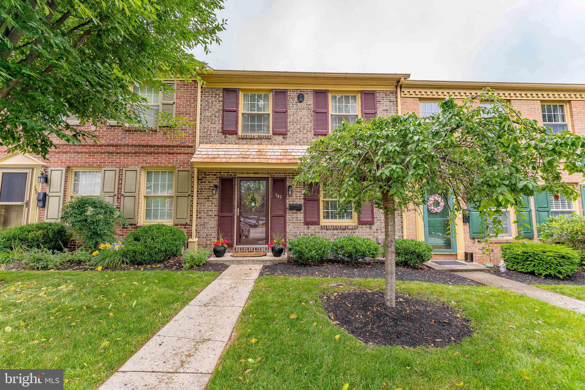 Welcome to 149 Roboda Boulevard — a charming 3-bedroom, 1.5-bath townhouse nestled in the desirable Roboda neighborhood of Royersford, perfectly situated within the award-winning Spring-Ford School District, recognized as one of the best in Pennsylvania. As you approach the home, a walkway guides you to the inviting front entrance. Step inside to a welcoming foyer with stylish luxury vinyl plank flooring that continues into the eat-in kitchen. The spacious living room features cozy carpeting, decorative ceiling beams, crown molding, chair rail detailing, a ceiling fan with light, and sliding glass doors that lead to the back deck — the perfect spot for relaxing or entertaining. Adjacent to the living room is a formal dining room, also carpeted and accented with classic wainscoting and chair rail trim. A passthrough opens into the bright and functional kitchen, which boasts granite countertops, stainless steel appliances, tile backsplash, a pantry, and ample space for casual dining. A convenient powder room completes the main level. Upstairs, the primary bedroom offers comfort and space with wall-to-wall carpeting and a ceiling fan. Two additional carpeted bedrooms provide flexibility for family, guests, or a home office. The updated full hall bathroom features luxury vinyl plank flooring, a double sink vanity with granite countertops, and a tub/shower combination. The partially finished basement offers additional living space with a family room enhanced by recessed lighting and durable LVP flooring — ideal for a playroom, media room, or workout area. The unfinished section houses the laundry area with a washer and dryer and provides additional storage options. Step outside to a private, fenced-in backyard complete with a patio, a small shed, and plenty of space for outdoor gatherings. Conveniently located near local schools, shopping, and grocery stores, this move-in-ready home combines comfort, character, and convenience. Don't miss your opportunity to make 149 Roboda Boulevard your new home!