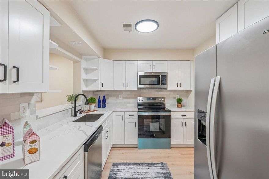 Fully Gorgeous renovated Condo/townhouse in  Silver Spring at an affordable price!!! Condo includes Modern Renovations: Every aspect of the home has been thoughtfully upgraded, ensuring a stylish, move-in-ready living space. Private Bedrooms: The top level offers Three  spacious bedrooms, each with plenty  of storage and a full Top of line remodeled bathroom , Updated Kitchen: The lower level features a sleek, updated kitchen with upgraded floors, blending modern design with functionality with open living dining area  that opens up to  a versatile space with a renovated half bath, perfect for entertainment, a home . Outdoor Space: The walkout patio door  leads to open patio  backyard, offering room for relaxation, gardening, or entertaining. This home has Brand new Kitchen, New HVAC, New Water heater, New windows, new floors, new appliances, New baths and list goes and on...  Location is Ideal : Situated in Silver Spring, this home provides convenient access to shopping, dining, entertainment, and transportation. Walking distance from the White Oak Town Center. Make your  appointment today!