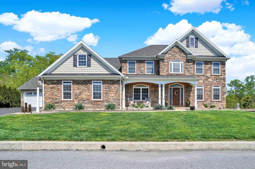 This impeccably designed, luxury home is better than new with a 1st floor primary suite, finished lower level, 4-car garage & in-ground salt water pool. Inside and out, this home offers what many are lacking-- space to spread out! Above grade and below grade finished square footage combined totals more than 5,000+ sqft! The heart of the home is a showstopping living room with coffered ceiling, custom built-in bookshelves, cozy fireplace & a trio of tall windows with transoms. The kitchen is both stunning & functional complete with solid wood cabinetry, granite countertops, stainless steel appliances (double ovens, new dishwasher (2025) & built-in ice maker!), tiled backsplash, pantry, and center island. Enjoy meals either in the formal dining room with classic details like chair rail/moldings or in the windowed breakfast nook with fantastic views year-round and easy access to the deck. Working from home? There is a dedicated office off of the foyer that offers privacy while still remaining connected to the main living space. True one-floor-living is possible in this home with an outstanding primary suite on the 1st floor complete with spacious bedroom, double closets, and full bathroom with double sinks/vanities, and a tiled walk-in shower. Not to be outdone, upstairs you'll find the second primary suite, a tranquil retreat with tray ceiling, enough room to comfortably fit a king sized bed, walk-in closet, and attached full bathroom equipped with soaking tub, tiled shower with bench, and tons of storage in the oversized vanity. There are 3 additional bedrooms on the 2nd floor, each with unique features: one bedroom has a private attached full bathroom, one bedroom has huge double closets, and the last bedroom is cheerful with a custom painted mural. Laundry on the 2nd floor is complete with Speed Queen washer and dryer (2025), sink, and storage. Head downstairs to see a lower level done right! This daylight, walk-out basement boasts full size windows and access to the covered patio. The family room is spacious and versatile with stone accents, double-sided fireplace, and full bathroom. Step outside to experience exceptional outdoor living. Perfectly perched on a nearly half acre lot, the spectacular outdoor space begins on the full length composite deck offering privacy and picturesque views of nature. The 30+ potted plants are low maintenance thanks to a custom Rainbird drip irrigation system that waters them for you! 3 staircases connect the upper deck to the lush lawn and the patios below. The sparkling 55' x 35' saltwater, gunite pool surrounded by expansive paver patios create a backyard that would be impossible to replicate. The outdoor stereo system and Haywood 550k BTU pool heater (2026) help to make this space enviably comfortable. Glimmering lights placed along the landscape, stairways, pathways, and retaining walls light space beautifully. A truly custom backyard oasis wouldn't be complete without an Alfresco outdoor kitchen equipped with fridge, sink, full sized grill, and two cooktops! Enjoy meals under the 14' x 14' gazebo with wood beam accents or relax and unwind around the built-in firepit. A built-in shed tucked under the deck keeps toys and pool equipment nice and tidy. This backyard is nothing short of spectacular! Every home needs good “bones” and this home boasts features meant for peace of mind including instant hot water from 2 tankless hot water heaters, 5 ton A/C unit (2025), Honeywell security system on all windows and doors, Outdoor camera security system, and even a fully integrated window candle system. The unbelievable construction of this home extends even to the garage with 2-car bays attached and an additional 2-bays in the oversized detached garage equipped with an RV hookup. The next owner will undoubtedly appreciate the superb pride of ownership, spectacular quality construction, and generous space this Hampden Summit, CVSD home provides.