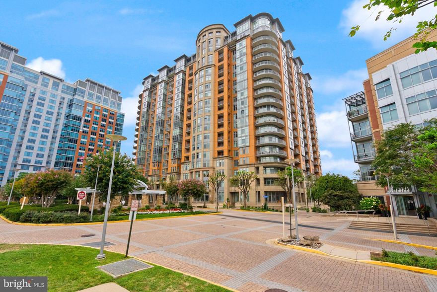 Experience luxury living in the heart of Tysons! This spacious 1 bedroom + den, 2 full bath condo at One Park Crest offers an open, modern layout with floor-to-ceiling windows and upscale finishes. The building features a rooftop pool with panoramic views, fitness center, elegant clubroom with pool table, guest suites, and 24-hour concierge. Enjoy the ultimate convenience—walk to the Silver Line Metro, bus stop, Tysons Galleria, Tysons Corner Center, and endless dining options. With major commuter routes just a mile away, this home blends luxury, lifestyle, and location all in one!