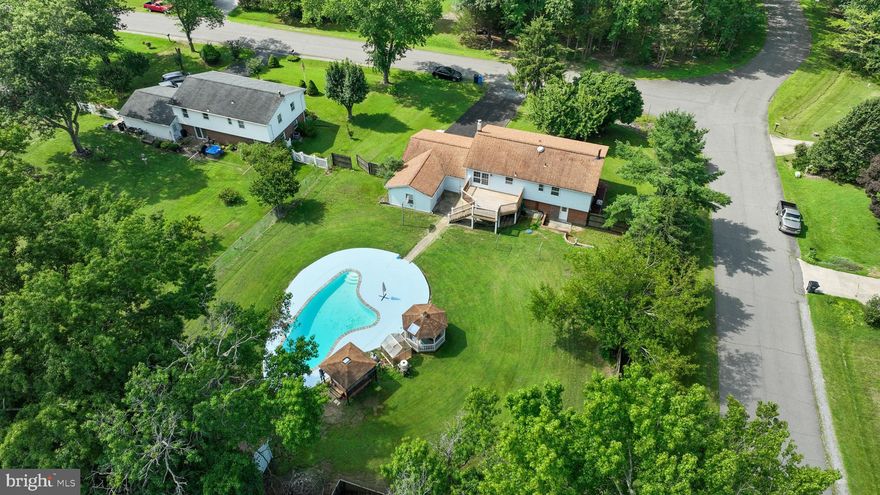 Welcome home to 37420 Handel Dr—your peaceful 5 bedroom/3 full bath (with an in-law suite!) retreat tucked away on a quiet street in sought after Charlotte Hall! Step through the front door to tons of natural lighting, fresh paint throughout, crown molding, and an open layout designed for easy everyday living! Spacious family room/living area with hardwood floors, a connected dining area with door leading to deck (deck replaced in 2024!), and a kitchen attached with stainless steel appliances and window overlooking your fenced-in backyard with an in-ground pool AND hot tub! The best of both worlds! The main living level offers plenty of room to spread out with a primary bedroom with a walk-in closet, full bath attached, 2 additional nicely sized bedrooms and a full hallway bathroom. All bedrooms with brand-new carpet. Need additional space for hobbies, guests, or storage? The lower level provides endless options to create the retreat you’ve been dreaming about! A large rec room with a wood-burning stove, a wet-bar with a sink and storage, a full in-law suite with a second kitchen, full bathroom, bedroom #4, bedroom #5, and outdoor access. Out back, a private fenced-in yard is ready for summer barbecues, gardening projects, or quiet evenings soaking in your pool and/or hot tub. Other features include a two- car attached garage, one attached shed, and one detached shed... Also, roof just five years young, and house equipped with lightening grounding system. Whether you love hosting holiday dinners, working from a dedicated home office, or simply enjoying weekend movie nights, this home adapts to your lifestyle. Best of all... you’re just minutes from local shops, parks, and commuter routes, and more, giving you the perfect blend of small-town charm and everyday convenience! Schedule your tour today!