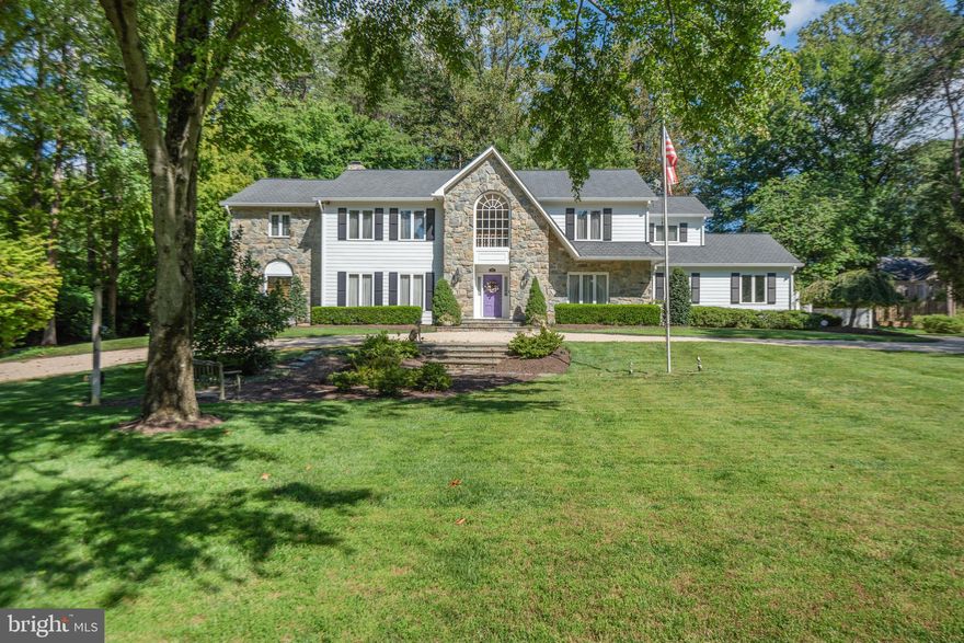 Unveiling an extraordinary residence nestled within the prestigious McLean Summerwood development. This impeccable estate caters to those seeking idyllic living infused with timeless elegance. This haven of expansive spaces, breathtaking landscaping with a tranquil pool, koi pond, and running stream awaits your discerning vision.  The Summerwood location means enjoying the best of McLean. School children attend Fairfax County Schools in the Langley school pyramid. Enjoy easy access to all the amenities the vibrant community of McLean and Tyson's Corner offers.
This four bedroom, five full and one half bath home has been meticulously maintained for your ultimate comfort and enjoyment. Step inside and be greeted by a symphony of light and space. Upon entering, you'll be greeted by a grand foyer that leads to the main level, featuring a spacious living room, elegant dining room, a two-story great room, a versatile library/office, and a gourmet kitchen.  The great room is filled with light from a wall of windows overlooking the patio and landscaped backyard and features a floor to ceiling masonry stone gas fireplace and bar area. The library off the Great Room features a wall of built in book cases and elegant gas fireplace.
The large chef's kitchen with cherry wood cabinetry has a dining area with gas fireplace making meal preparation a joy. Gather loved ones in the formal dining room for elegant evenings, or enjoy casual meals in the breakfast area adjoining the kitchen.  Directly off the kitchen is the sun-drenched solarium with built in bar and elevator to the primary suite. The solarium provides access and views of the sparkling pool and pond. It incorporates the pool bath, complete with a changing area, shower, toilet, sink, and dryer offering convenience and functionality for poolside activities.
Retreat to the luxurious primary bedroom suite, a sanctuary of comfort and elegance. A small foyer leads to a walk-in closet, the primary bathroom, and the primary bedroom. The bedroom features a vaulted ceiling and a gas fireplace. The spa-like en-suite bathroom  boasts a deep soaking tub, walk-in shower, double sinks, multiple closets and dressing area. On the second level are three additional bedrooms: one with an en-suite bath with a shower, and the other two sharing a Jack & Jill bath with a tub, shower, and double sinks, offering flexibility and privacy for family and guests.
The expansive finished basement is a haven for entertainment and recreation. Watch movies by the crackling gas fireplace, enjoy a beverage at the built-in bar, or simply unwind in this spacious haven. There is a bonus room with en-suite bath and large walk in closet for seasonal clothing storage.  A dedicated laundry with ample storage space and utility rooms provide for all your needs.
Step outside to your own private sanctuary. Immerse yourself in the refreshing waters of the pool, relax on the expansive deck, enjoy the tranquility of the koi pond and the gentle sounds of the babbling stream.  Entertain on the flagstone patio, ideal for alfresco dining. The fully fenced backyard provides a secure haven for children and pets to play.  The attached oversized two car garage with interior basement access completes the home.
The overall condition of the home is excellent, three-quarters of the window were replaced in January 2024 with top-of-the-line Andersen windows, and the roof replaced in 2019. The home has Hardie brand cement board pre-pigmented siding for durability and easy maintenance.  Located in the sought-after McLean and Tyson's Corner area, this residence offers convenient access to a plethora of dining, shopping, and entertainment options. With close proximity to transportation options, including major highways and public transit, commuting to and from this desirable location is a breeze.
Don't miss the opportunity to make this exceptional property your own and experience the epitome of luxury l