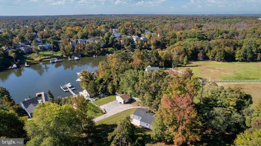 This magnificently designed rancher-style home is 3 bedrooms, 2 full bathrooms with over 1200 square feet in living space and sits across from Long Cove with a a peaceful view of the water. The Long Cove body of water leads out to Stoney Creek and subsequently the Patapsco River providing many options for family fun and club memberships.

Your new home has been updated from top to bottom with new luxury vinyl plank flooring throughout and each room has been freshly painted to bring in loads of natural light. Entering the home you immediately fall in love with the open floor plan which flows through the spacious living family and dining space into a completely new and upgraded kitchen. The new cabinets and stainless steel appliances are accented with custom granite counters and ample storage and counter space. Each of the bathrooms has been completely renovated with custom tiling, fixtures, vanities and more. The primary bedroom sits with a walk in closet and up the private stairs, you will find a separate loft area great for a morning room or home office. The outdoor living space provides great options for relaxing and entertaining. This home features a new roof (replaced October 2023), new stainless steel appliances (upgraded Oct 2023), HVAC compressor (2022), water heater (2023), water filtration system (2022) and more.

There is so much more to see in person and you will be sure to love the peace and privacy you will find with your new home!! Come and take a look.