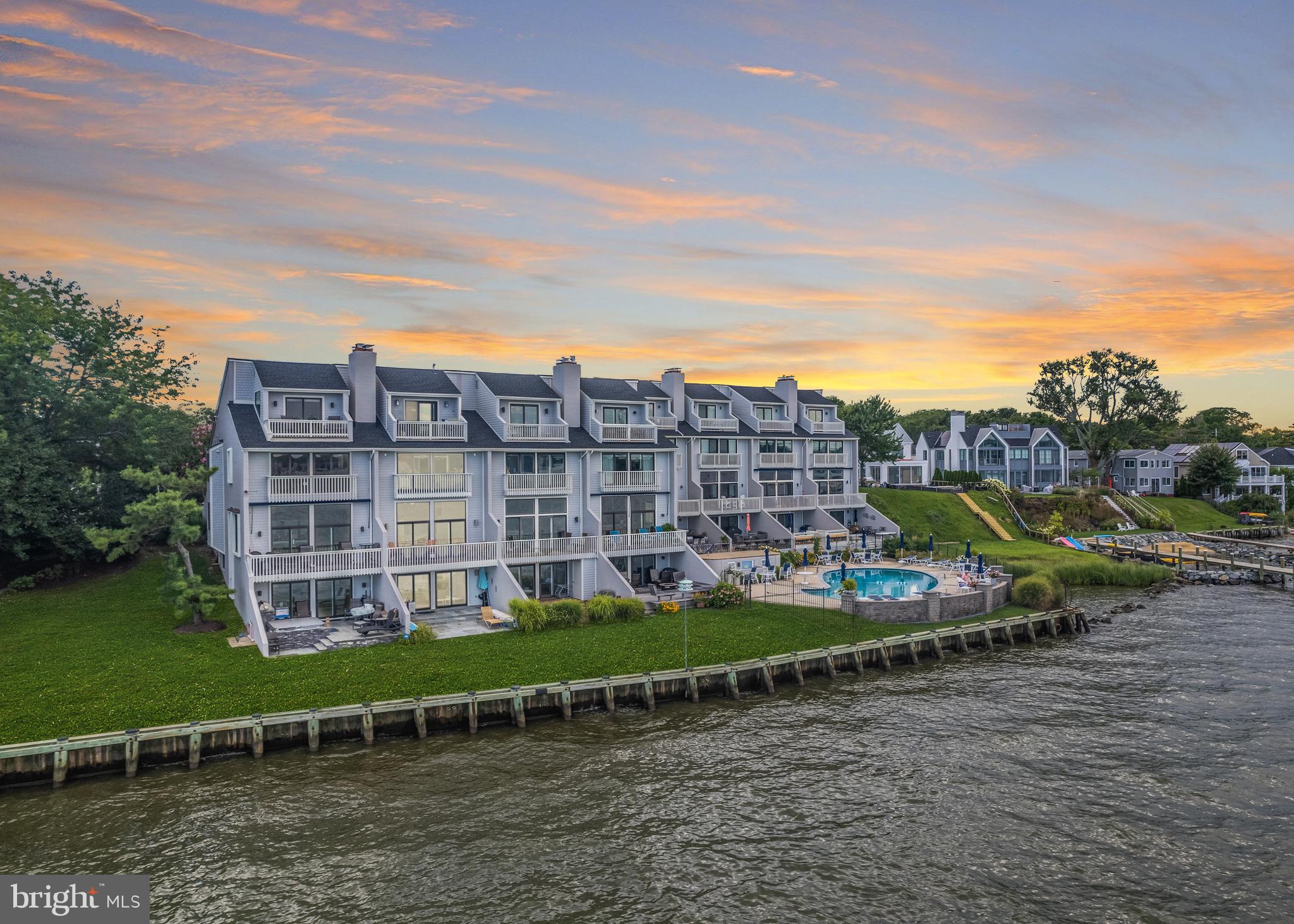 A Symphony of Living: Experience the Perfect Blend of Location and Luxury
Welcome Home.
From the moment your hand graces the sleek, contemporary front entrance, a transformation begins. Suddenly, the daily hustle fades, replaced by the symphony of Annapolis life—a life where luxury meets the local, and where the comfort of community complements the refinement of individual craftsmanship. Spread across this exquisite abode are four spacious bedrooms, each a haven of tranquility and comfort. The three and a half bathrooms exude modern elegance, with designer finishes ensuring every moment spent within is one of luxury.
Upon entering, the gleam of refinished oak hardwood floors in sophisticated slate grey beckons you in. Every step inside is met with state-of-the-art upgrades, from the ambient light of integrated occupancy sensors to state-of-the-art sound and safety systems.
Yet, beyond the walls of this opulent dwelling, the vibrant pulse of Eastport calls. The aroma of freshly brewed delights from Oscar's Coffee calls your name, and just a stroll away, establishments like Boatyard Bar and Grill, Lewnes Steakhouse, and the sumptuous Ruth’s Chris vie for your attention.
Back home, the kitchen is a gourmet dream. The 36” Wolf gas range, electric pro oven, and a monumental SubZero refrigerator stand ready to transform fresh local ingredients into culinary masterpieces. For that special touch, the lavish Silestone Rolling Fog countertop glistens, tying the dining and kitchen areas together in aesthetic harmony.
Outside, whether you stand on the completely redesigned deck or the stunning balcony, the sights and sounds of Annapolis serenade you. The distant trumpets of the naval academy greet the day and bid it farewell. Chapel bells ring in melodious synchrony, blending with the sight of midshipmen steering their training vessels. On celebratory nights, fireworks from Annapolis, the eastern shore, and even Baltimore light up the sky. And every Wednesday throughout summer, the thrill of sail races unfolds against the backdrop of unparalleled sunrises and sunsets.
Inside, the lavish touches continue. The powder room boasts designer accouterments, while the master bathroom offers an escape into steamy serenity, adorned with Calacatta Laza quartz stone. And for those who value adaptability, the home gym is a versatile space, waiting for your touch to shape its destiny.
Built-in storage, sophisticated finishes, smart home features—they're all here. Yet, it's the seamless blend of indoor luxury with the vibrant community pulse of Eastport that truly defines this home. Here, memories aren't just made; they're lived, day in and day out.
Welcome to a life of grandeur, grounded in community. Welcome home.