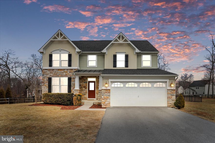 Your home search stops here because this property will fulfill all your desires! A spacious and elegant colonial that's impressive from the moment you enter the grand 2-story foyer. The main level boasts a gourmet kitchen adorned with granite counters, brick backsplash, ceramic tile flooring, stainless steel appliances, center island and breakfast bar. Off the kitchen is a morning room with access to the rear deck/patio and offering a light and refreshing feel provided from the many windows that encase it. Also off the kitchen is a spacious family room and a formal dining room with hardwood flooring. The half bath on the main level is uniquely attractive with shiplap walls and well-matched vanity. The upper level offers an impressive primary suite with tray ceiling, crown molding, walk-in closet and luxurious updated bath featuring tiled floor, double vanity with granite top, a massive walk-in tiled shower with double shower heads and an additional walk-in closet. There's three other bedrooms that are all nicely sized and two offer walk-in closets and a full bath with double vanity. The laundry room is also conveniently located on the upper level. The full basement provides a huge amount of space for future finishing and/or storage, rough-in for a bath and outside entrance to the rear yard. The rear yard will be your personal retreat - relax or entertain on the covered deck or patio with firepit and enjoy plenty of space to play in the large yard that's fully fenced. All this situated in Brookfield on the Potomac which offers private river access, boat ramp, picnic area, playgrounds and abundant common areas. This IS the one so don't hesitate to schedule your showing!