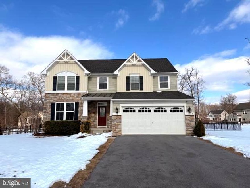 Your home search stops here because this property will fulfill all your desires! A spacious and elegant colonial that's impressive from the moment you enter the grand 2-story foyer. The main level boasts a gourmet kitchen adorned with granite counters, brick backsplash, ceramic tile flooring, stainless steel appliances, center island and breakfast bar. Off the kitchen is a morning room with access to the rear deck/patio and offering a light and refreshing feel provided from the many windows that encase it. Also off the kitchen is a spacious family room and a formal dining room with hardwood flooring. The half bath on the main level is uniquely attractive with shiplap walls and well-matched vanity. The upper level offers an impressive primary suite with tray ceiling, crown molding, walk-in closet and luxurious updated bath featuring tiled floor, double vanity with granite top, a massive walk-in tiled shower with double shower heads and an additional walk-in closet. There's three other bedrooms that are all nicely sized and two offer walk-in closets and a full bath with double vanity. The laundry room is also conveniently located on the upper level. The full basement provides a huge amount of space for future finishing and/or storage, rough-in for a bath and outside entrance to the rear yard. The rear yard will be your personal retreat - relax or entertain on the patio with firepit and enjoy plenty of space to play in the large yard that's fully fenced. All this situated in Brookfield on the Potomac which offers private river access, boat ramp, picnic area, playgrounds and abundant common areas. This IS the one so don't hesitate to schedule your showing!