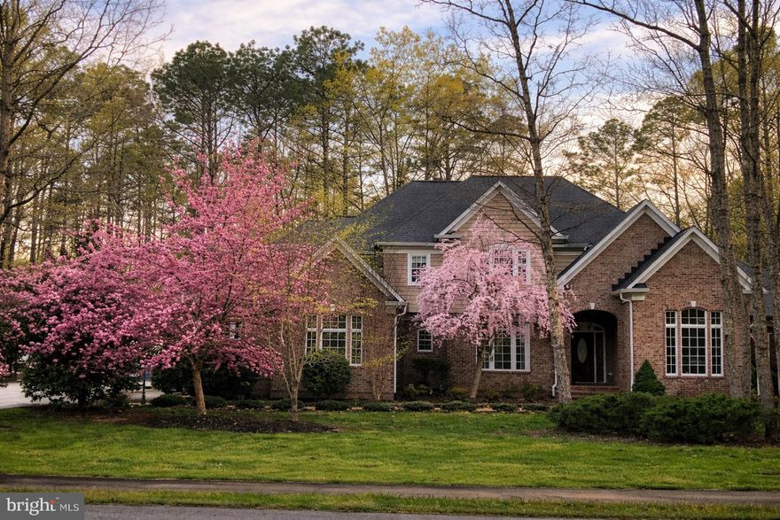 Welcome to this pristine custom home located in the heart of Fawn Lake, where timeless elegance meets modern luxury just moments from premier neighborhood amenities and the country club.
Every inch of this exceptional home has been thoughtfully designed, with custom moldings, exquisite finishes, and a stunning Italian chandelier adding a refined touch to every room. The open and inviting layout offers both sophistication ad functionality, perfect for everyday living and entertaining alike.
The main-level owner’s suite is a private retreat, complete with a spacious sitting room and a custom-designed addition featuring his and her walk-in closets, beautifully outfitted with built-in shelving, custom drawers, and even a dedicated shoe closet. A main-floor office provides the ideal work-from-home space.
Each bedroom is generously sized and features its own private en-suite bathroom and walk-in closet, ensuring comfort and privacy for all.
The fully finished basement expands your living space with a stylish bar, private office, and a dedicated gym, creating the ultimate environment for relaxation and recreation. The basement also has a room that can be used as a bedroom along with a full sized bathroom. 
This home is equipped with top-tier conveniences including a whole-house generator, water softener system, central vacuum, and irrigation system, along with a spacious three-car garage and more.
Step outside to enjoy the beautifully landscaped grounds, highlighted by gorgeous cherry blossom trees that create a truly picturesque setting.
This is more than a home—it’s a lifestyle. Experience luxury living at its finest in one of Fawn Lake’s most sought-after locations.