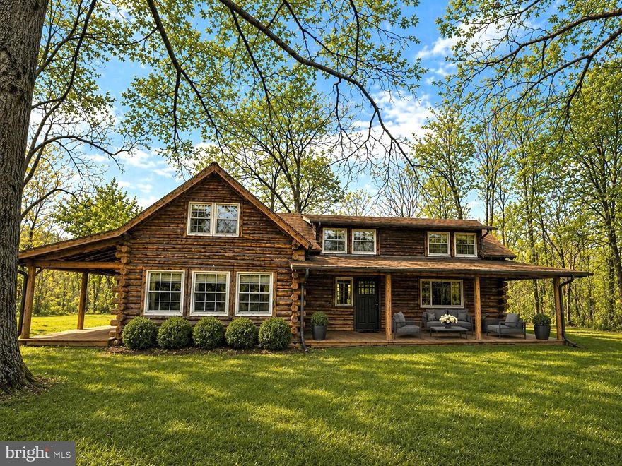 Tucked away on 10 private acres just off Snickersville Turnpike, this authentic log home offers a rare sense of quiet and seclusion in one of Purcellville‘s most scenic settings. Surrounded by mature trees, the property feels worlds away while remaining incredibly well located. 

Inside, the home is warm and inviting, anchored by a beautiful stone fireplace that brings a natural focal point to the living space. Layout is comfortable and easy with three bedrooms and a scale that feels manageable without sacrificing character.