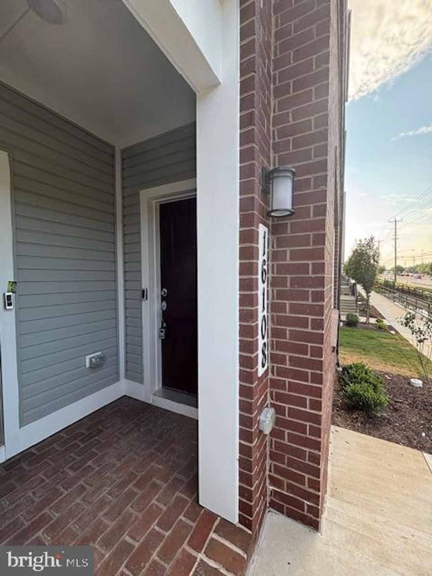 Rent Reduce;Brand new beautiful 3 bedroom 2.5 bath luxury two level apartment. The apartment has hardwood floors on the first floor, kitchen with quartz countertops and brand new stainless steel appliance. Upper floor is carpeted throughout and includes in unit full size washer and dryer. The master bedroom boasts two large walk in closets, a master bath, and a private balcony.  The apartment also includes an attached one car garage. Located in a brand new development near King Farm with restaurants, amenities, and metro within walking distance.