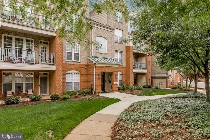 This beautiful and spacious 2nd floor luxury condo offers stunning views from all windows and the balcony. This unit comes with an attached garage which is an added bonus for convenience and in winter months.  Great for additional storage and not all units have this feature so it's a great feature!  This unit is light filled, has a nice floor plan with gourmet kitchen and gas fireplace and large bedrooms with attached bathrooms. 
Newer HVAC and washer/dryer too.  Located close to Reston Town Center, shopping, restaurants, the Dulles Toll Road, Reston Hospital, the W&OD Trail, and more, this property offers both convenience and luxury living in Madison Park.  Don't miss out on this incredible opportunity to own an amazing condo!