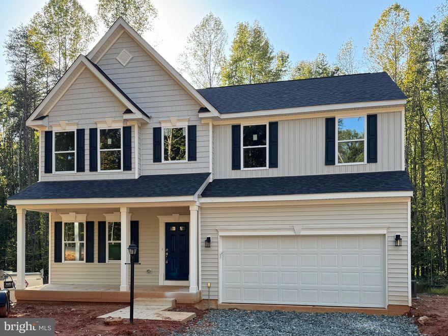 Get ready to move into this stunning summer home near Rt 17 and I-95, offering 3 acres of privacy! The Hoover Floorplan features a covered front porch and a 2-car garage. The main level boasts a 2-story foyer, a gourmet kitchen, a gas fireplace in the family room, a sunroom extension, and a 10x20 composite deck in the backyard. Upstairs, you'll find 4 bedrooms, including the owner's suite, and three full baths, with a beautifully upgraded Platinum Owner's Bathroom. The lower level is fully finished, complete with a full bathroom and a sliding door exit to the backyard. Pricing includes several interior upgrades, such as hardwood flooring throughout the main level, tile additions in bathrooms, countertop and cabinet upgrades, and more.

Photos of similar model.