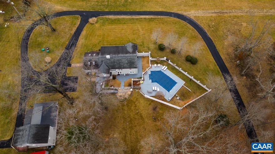 Follow the winding, wooded driveway to experience PANORAMIC MOUNTAIN VIEWS, a 5-BED, 3-BATH 3,070 FIN-SQ-FT MAIN HOUSE with PRIVATE POOL and a 2-BED-1-BATH BASEMENT APARTMENT, a separately-metered DETACHED COTTAGE containing TWO SEPARATE 1-BED, 1-BATH APARTMENTS and 1-car garage, as well as a BARN with RUN-IN SHED, all pristinely situated on 4.30 PARTLY WOODED ACRES with UNPARALLELED, BREATH-TAKING BLUE RIDGE MOUNTAIN VIEWS from every window! Enjoy ONE LEVEL LIVING at its finest and opportunity to make bountiful COTTAGE RENTAL INCOME! Entertain friends around the DOUBLE SIDED MARBLE GAS LOG FIREPLACE and prepare meals within the EXPANSIVE EAT-IN KITCHEN featuring skylights, granite counters, and large island! Located 5-min from Ruckersville, 9-min from Stanardsville, 15-min from the Skyline Drive access point, 15-min from Hollymead Shopping Center and the Charlottesville Airport, and just 35-min from Charlottesville/UVA! Open House CANCELED!,Granite Counter,Painted Cabinets,Fireplace in Dining Room,Fireplace in Family Room,Fireplace in Living Room