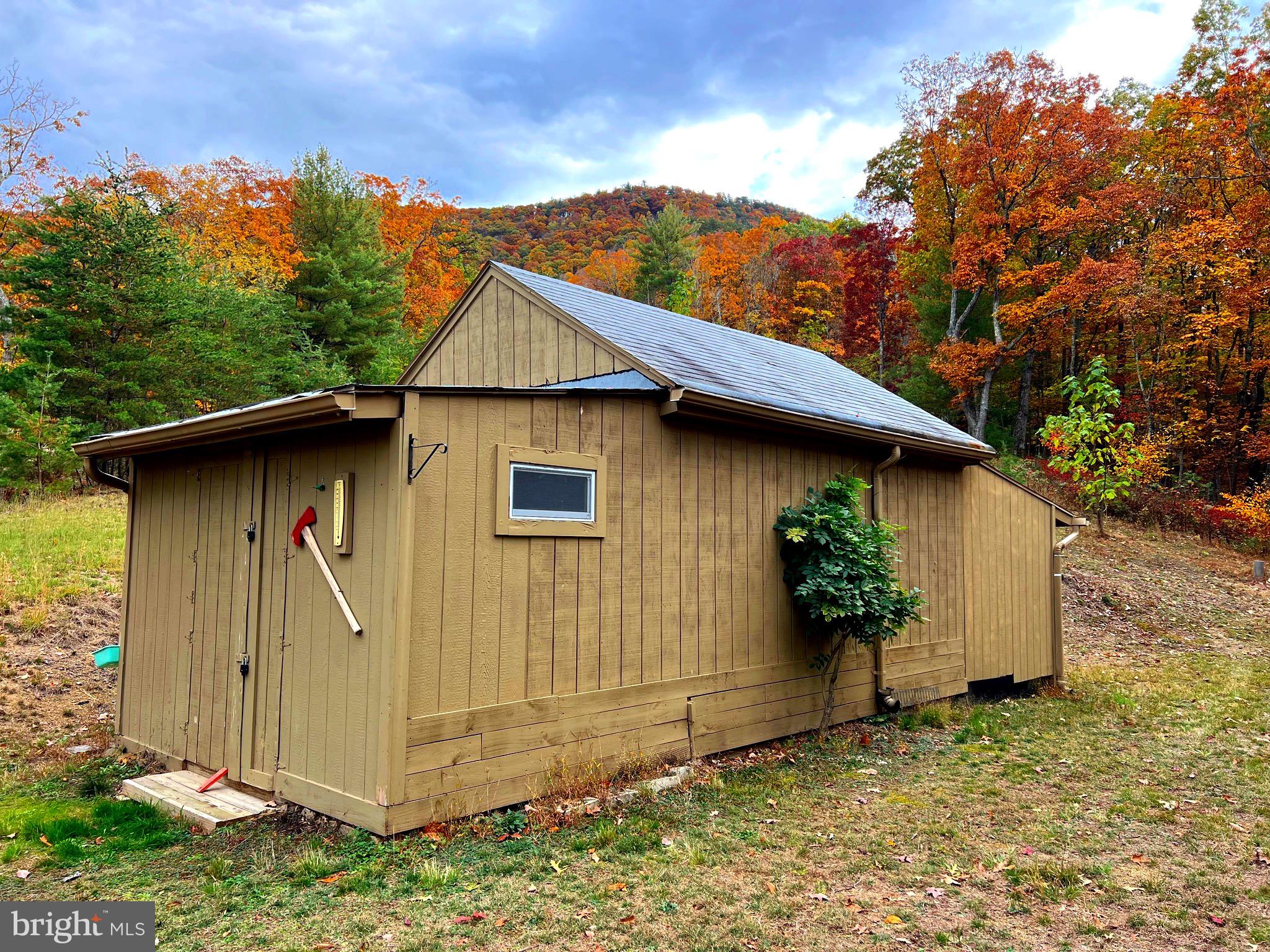 Great hunting on this 9.18 acre tract with a tiny house/work shop, electric, septic, and a land line phone for emergencies! Fiber optic is also available. Owners of lots in Potomac Valley Overlook also have joint ownership in a 5.11 acre tract with a community picnic pavilion that includes a well and septic. This additional tract overlooks a twelve acre lake/flood control dam and affords beautiful mountain views to southeast and southwest. You would also have access to 15,000+ acres of GW National Forest for your hunting, hiking and biking enjoyment! View Reynolds Knob from Lot 38 and additional panoramic views from the miles of Potomac Valley Overlook's interior roads. ATV's seem to be permitted if ridden responsibly. Lot 38 offers two cleared potential building sites. One currently used for private gun range by seller. Mineral rights convey!