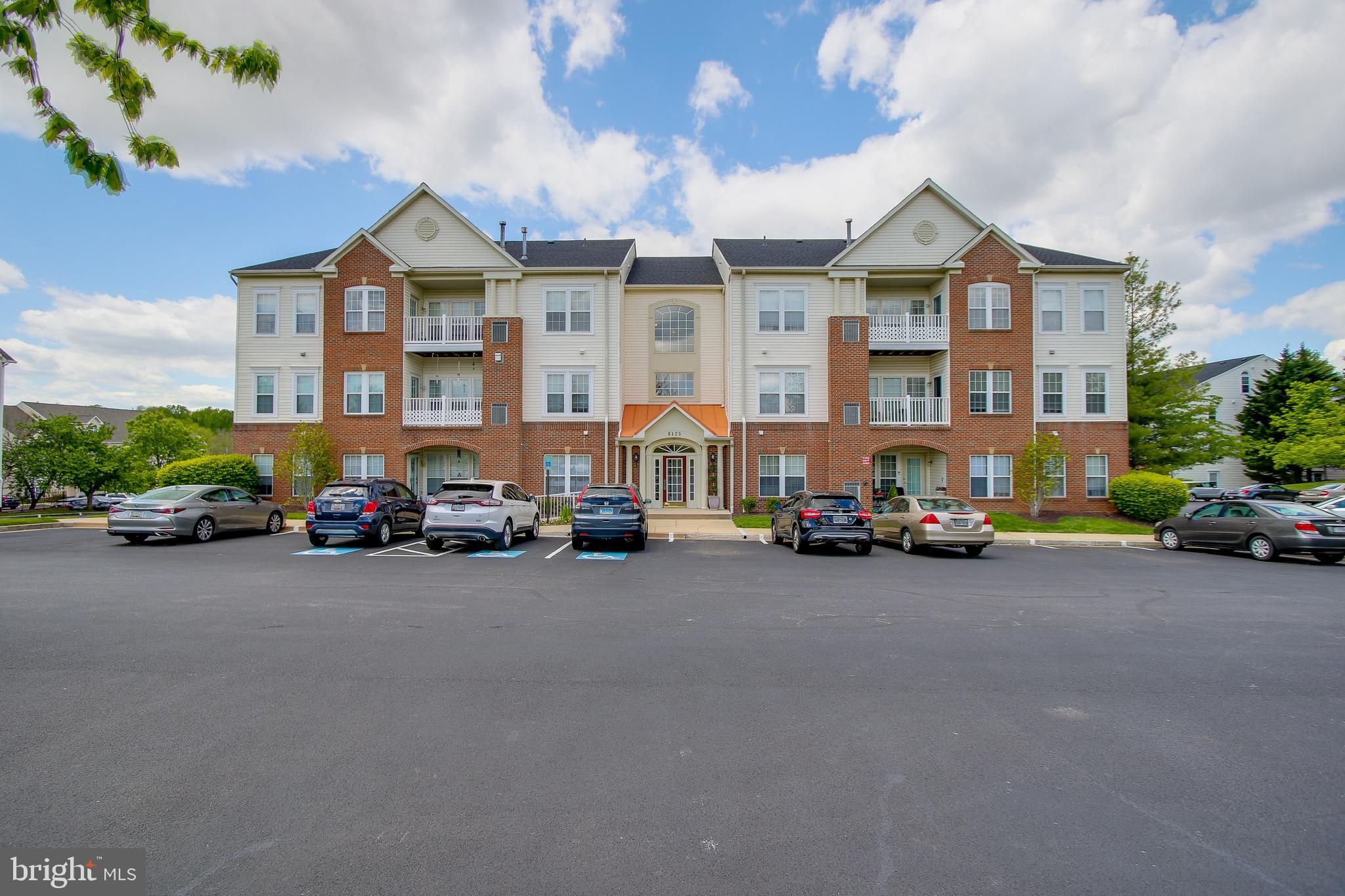 Move in ready to this gorgeous second level condo! Two LARGE bedrooms and 2 full bathrooms. You will LOVE the gleaming hardwood floors in foyer, dining and living room. Cozy up to the gas fireplace in the open living room. Enjoy sipping your morning coffee on the second level balcony off the family room. The kitchen has an opening to make a nice open concept! This is the sought after Spring Ridge community with tons of amenities! There are FOUR pools, tennis courts, soccer field, baseball field, tot lot, and much more. There are over 20 miles of walking paths around as well! NO City Taxes! Look no further, this home is just for you! This home is also listed for SALE in bright.