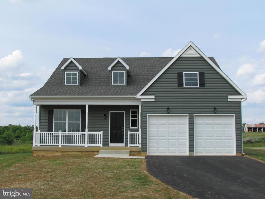 Brand New Construction in The Lakes at Martinsburg. Beautiful Rancher featuring 9' ceilings on a full unfinished basement sitting on a premium lot overlooking the Lake. Engineered hardwood flooring in living areas, with ceramic tile in kitchen and bathrooms. Kitchen has center island, granite tops and SS appliances. Covered front porch and 10' x  16' composite deck on back.