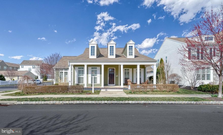 Warm, Welcoming Southern Charm Cape Cod on a corner homesite with white picket fence, sidewalks, streetlights, an enormous front and rear covered porch, in the heart of Central PA's highly sought after neighborhood of Walden. CV schools, low Silver Spring taxes, easy access to a plethora of amenities including the community walking trails, shops, restaurants, and parks. Warmth and elegance stated by rich hardwood floors, plantation shutters, transoms, coffered and tray ceilings, columns, and more. First floor owner suite, upscale five piece owner bath featuring double bowl undermount sinks with beautiful granite top, jetted tub, tile shower with glass door, expansive walk-in closet with organizers. In southern fashion, the washer and dryer are conveniently located in the oversized closet. Across the hallway, a large bedroom or den with access to a full bath. Impressive great room, chef's kitchen with breakfast area and formal dining room all connect graciously together for the perfect entertainer's space. And, when you're ready to retire for the evening with a good book as the sunsets, step into the tranquility and beauty of the light-filled solarium. A rare and exception space. The stylish kitchen features stainless steel 6 burner gas stove, commercial range hood, Bosch dishwasher, wall oven and microwave, GE refrigerator, pullout shelves in the pantry cabinet, tile backsplash and a party planner's dream island all topped with a stunning granite countertop. Upstairs, two very spacious bedrooms, walk-in closet, and full bath. From the two car garage, there is a central station equipped with cabinets, granite counter, and sink. Hook up for a washer and dryer and lots of storage space. Loaded with tall windows and light, from the hub of the home you can walk out onto a covered rear porch featuring an enormous stamped concrete patio. The corner homesite, picket fence, and landscaping create a wonderful space to garden or simply relax. The unfinished lower level is a great space for a gym, rec room, and storage. Walls have already been added, so it's just a matter of how far you want to expand. Highly efficient, three-zoned gas furnace. Gas hot water heater. Gas plumbed to easily add more lines. Air and water filtration systems. Humidifier. The complete package.  Don't wait! Schedule a private tour today so you can take your time and assure your own time slot. The similar floor plan just sold for $769,900 at the end of March 2025.