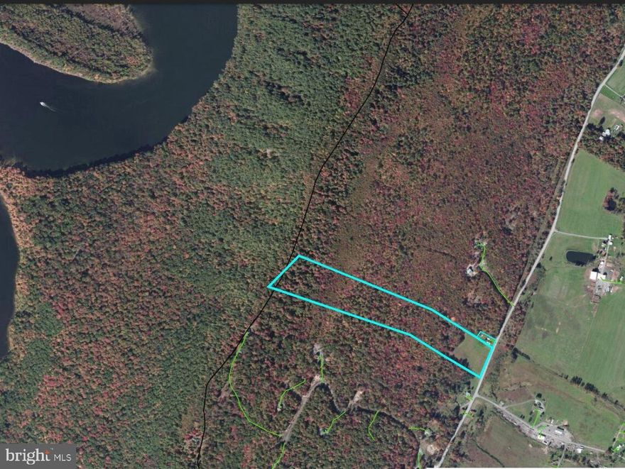 Opportunities like this don’t come often—nearly 22 acres of buildable land just minutes from Raystown Lake Resort, where you'll find a popular marina, boat launch, and dock access for endless days on the water. Located in one of the most sought-after areas near the lake, this property offers the perfect blend of seclusion, accessibility, and development potential. Whether you envision a private single-family retreat, a residential development, or even a commercial venture, the possibilities here are endless. From the highest point on the property, you can take in breathtaking views overlooking Raystown Lake, creating an incredible setting for a dream home, lodge, or business. The land backs directly up to State Game Lands, offering miles of untouched wilderness right in your backyard, and Trough Creek State Park is just minutes away, providing incredible hiking, waterfalls, and outdoor recreation. With Clean and Green status, ownership costs are reduced, making this an even more attractive investment. Whether you're seeking a primary residence, a vacation home, or an investment property, this land offers the rare chance to own acreage in a prime location near the lake. This is a once-in-a-lifetime opportunity to secure a large, versatile tract of land in the Raystown Lake corridor, where properties of this size and proximity to the water are increasingly scarce. Don't miss your chance to bring your vision to life in one of Pennsylvania’s most stunning natural landscapes. Contact us today for more details or to schedule a private tour!